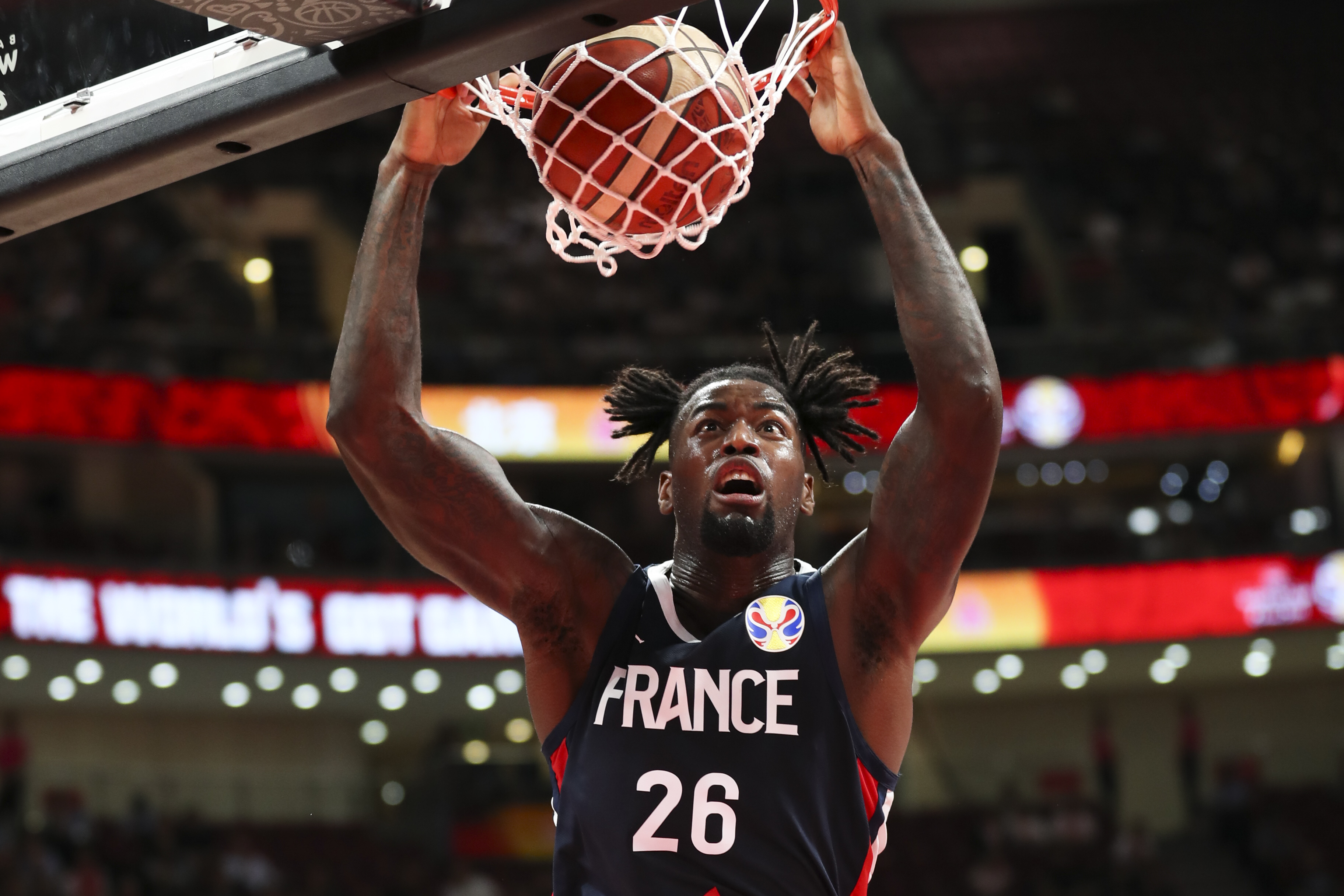 (190913) -- BEIJING, Sept. 13, 2019 (Xinhua) -- Mathias Lessort of France dunks during the semifinal match between Argentina and France at the 2019 FIBA World Cup in Beijing, capital of China, Sept. 13, 2019. (Xinhua/Meng Yongmin)