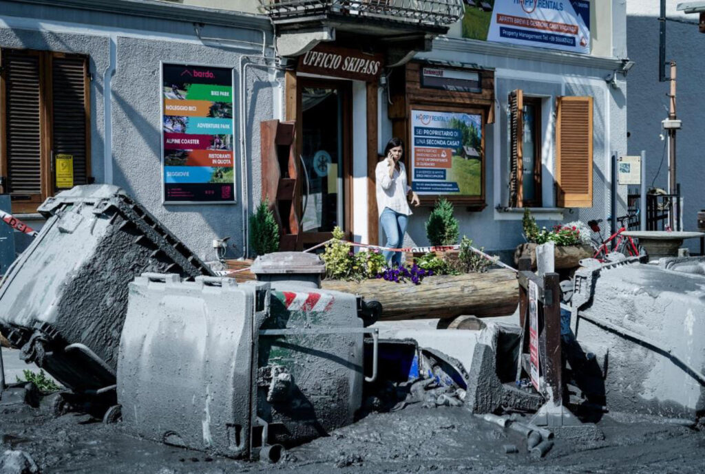 epa10799554 The scene in Bardonecchia, Italy, 14 August 2023, the day after heavy rain caused landslides in the Italian Alps. Rescues are searching for any possible missing people after a mountain stream burst its banks on Sunday.  EPA-EFE/Tino Romano