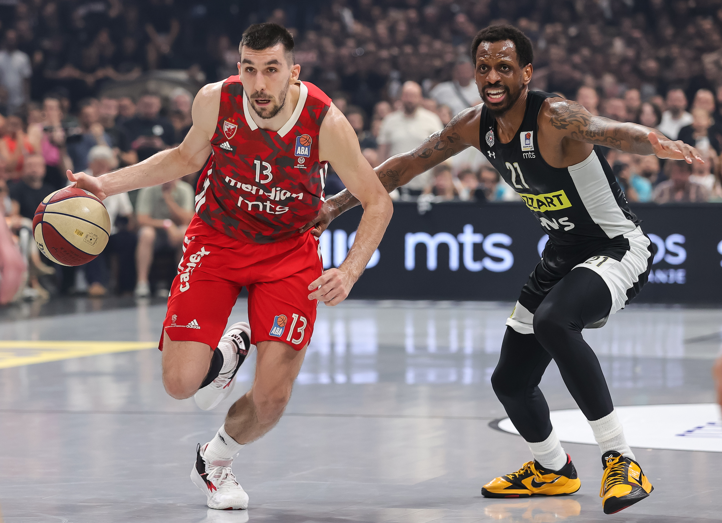 Ognjen Dobric (L) and James Nunnally during the Aba League Season 2022-2023 Play Off Final Game 5 between Partizan and Crvena Zvezda at Stark Arena on June 22, 2023 in Belgrade, Serbia. (Photo by Srdjan Stevanovic/Starsport.rs ©)