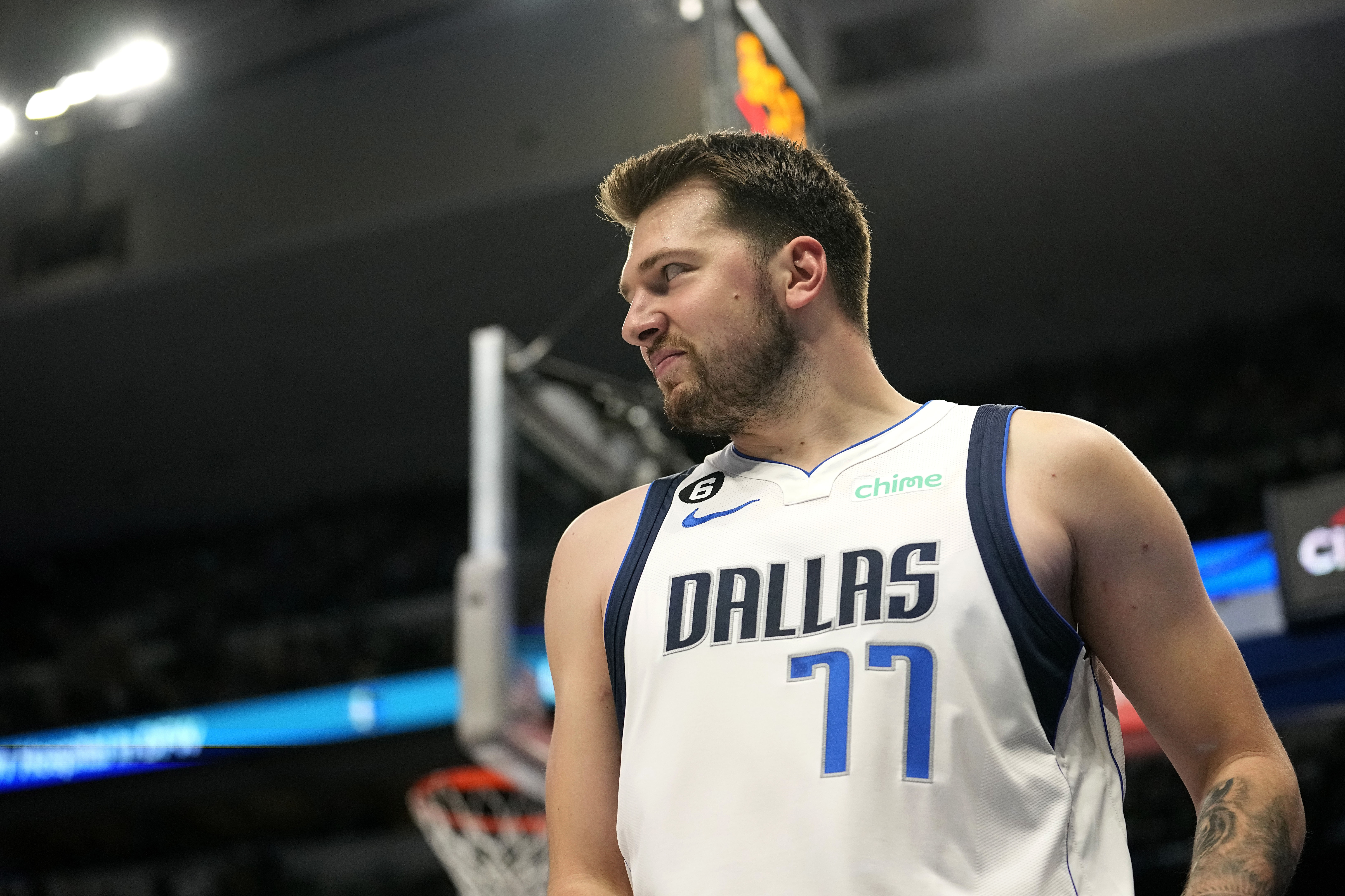Dallas Mavericks guard Luka Doncic smiles after attempting a basket in the first thalf of an NBA basketball game against the Chicago Bulls, Friday, April 7, 2023, in Dallas. (AP Photo/Tony Gutierrez)