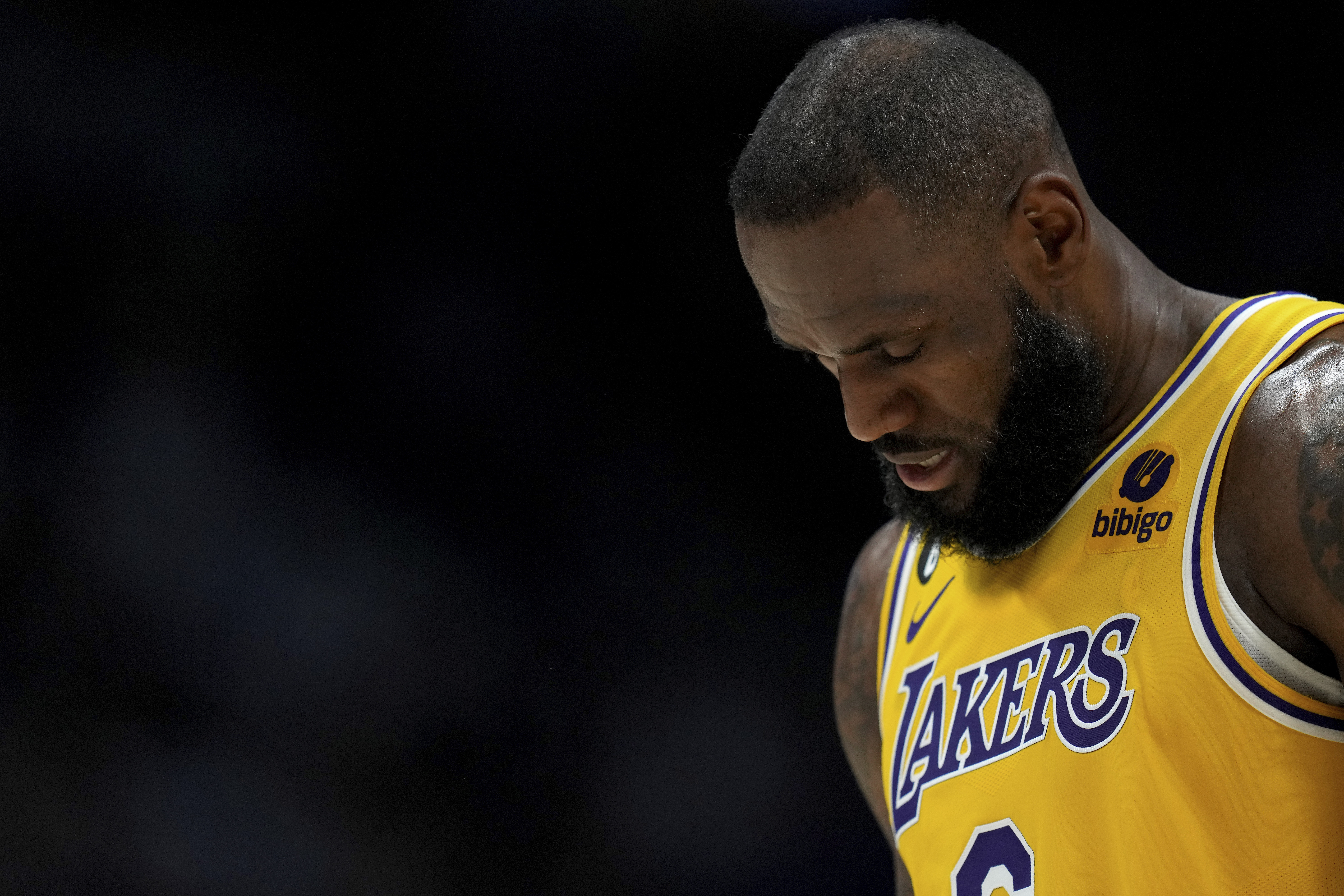 Los Angeles Lakers forward LeBron James (6) looks down during the second half of Game 2 of the NBA basketball Western Conference Finals series against the Denver Nuggets, Thursday, May 18, 2023, in Denver. (AP Photo/Jack Dempsey)