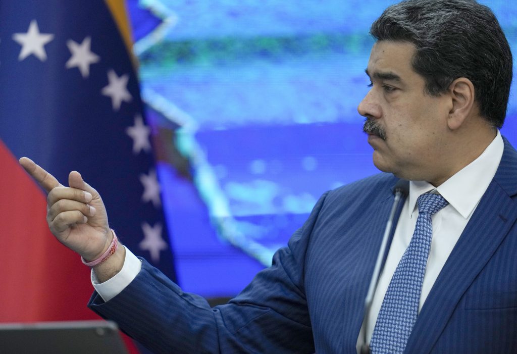 Venezuelan President Nicolas Maduro speaks during a press conference from Miraflores presidential palace in Caracas, Venezuela, Monday, Aug. 16, 2021. (AP Photo/Ariana Cubillos)
