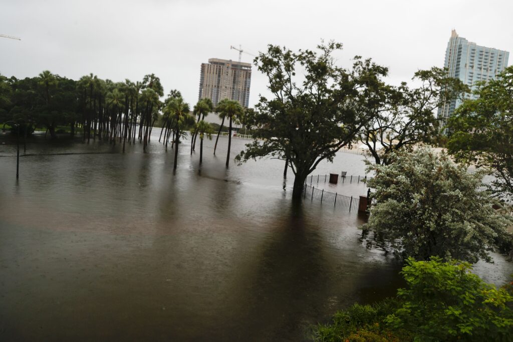 Water from the Hillsborough River rises onto Plant park at University of Tampa in downtown as Hurricane Idalia approaches the Big Bend region on Wednesday, Aug. 30, 2023. (Ivy Ceballo/Tampa Bay Times via AP)