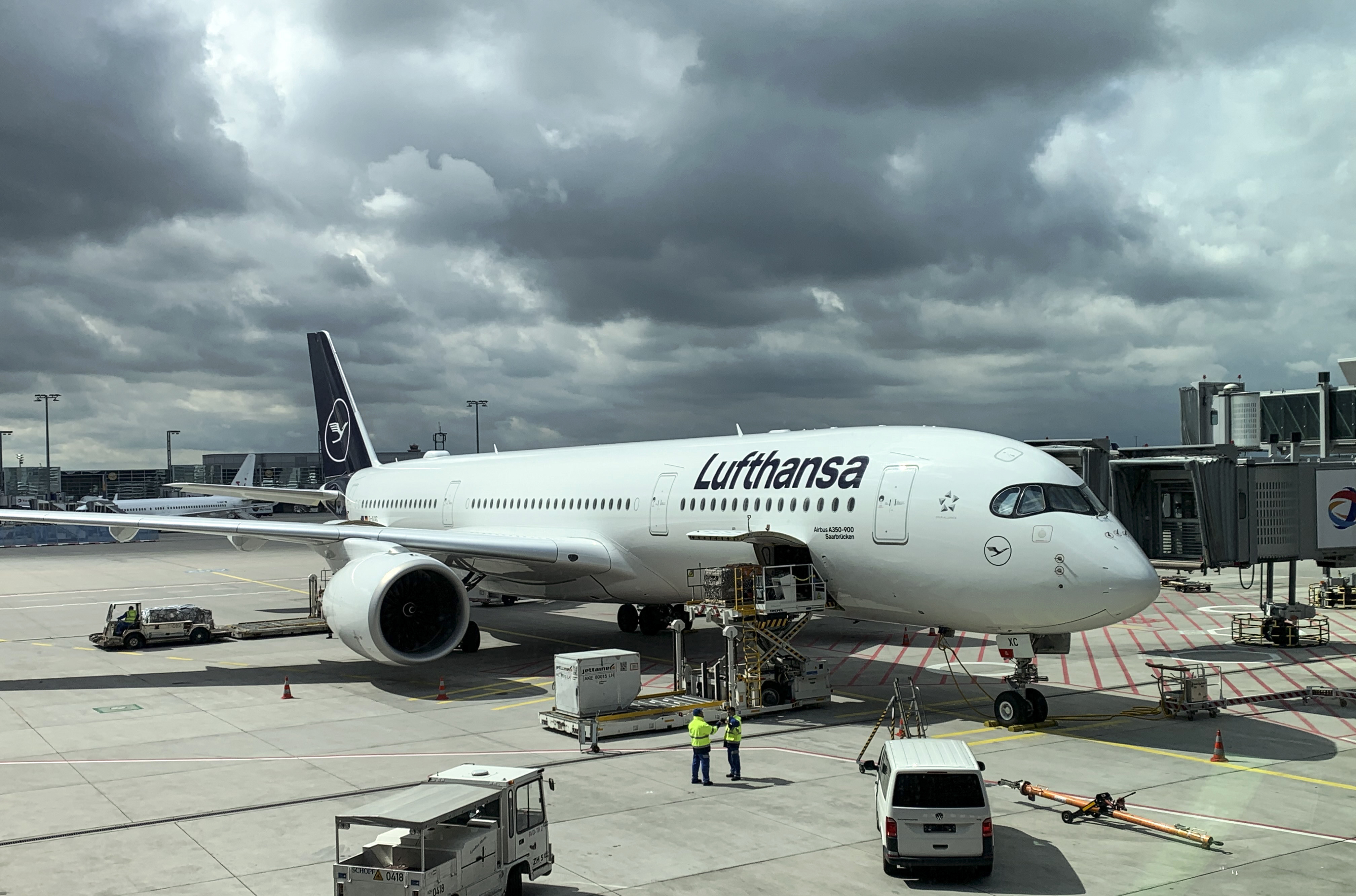 A Lufthansa jet is loaded at the airport in Frankfurt, Germany, Saturday, May 15, 2021. Lufthansa temporarily suspended flights to Israel until next week due to the Israeli Palestinian conflict. (AP Photo/Martin Meissner)