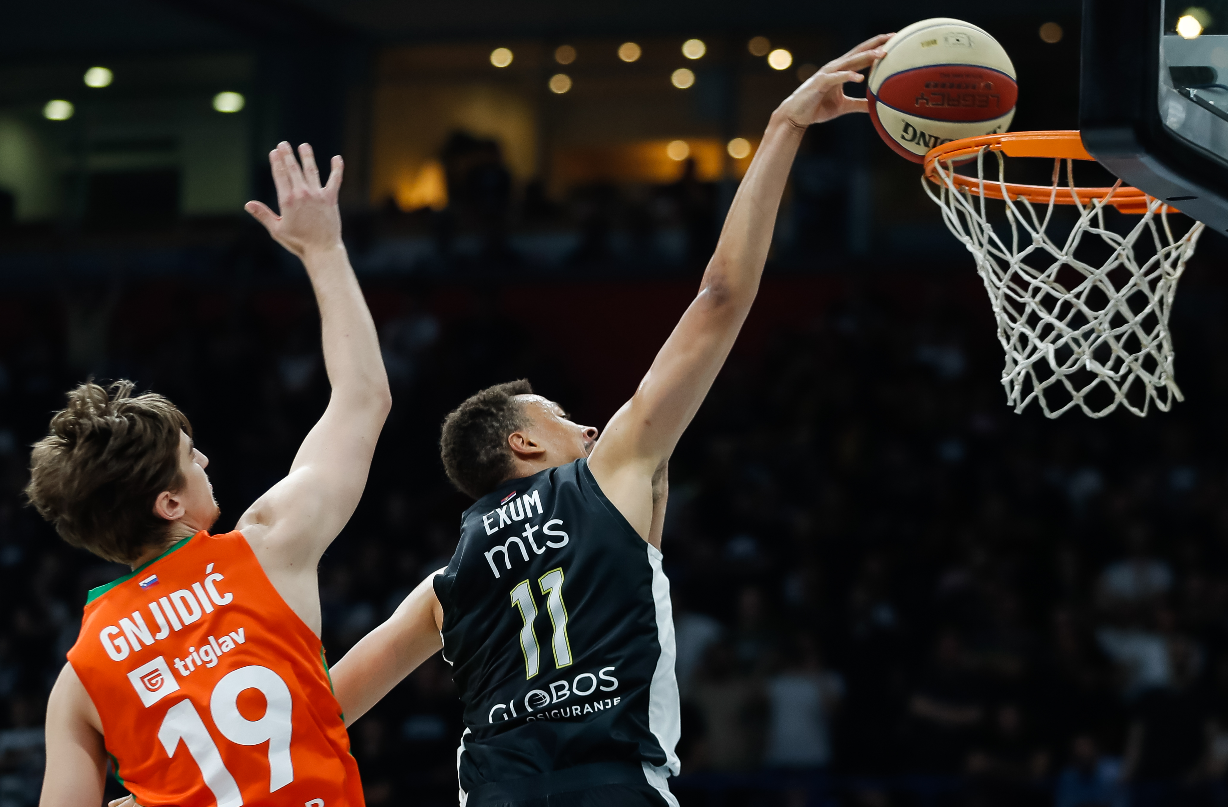 Dante Exum (R) and Lovro Gnjidic during the Aba League Season 2022-2023 Play Off Game 1 between Partizan and Cedevita Olimpija at Stark Arena hall on May 28, 2023 in Belgrade, Serbia. (Photo by Srdjan Stevanovic/Starsport.rs ©)