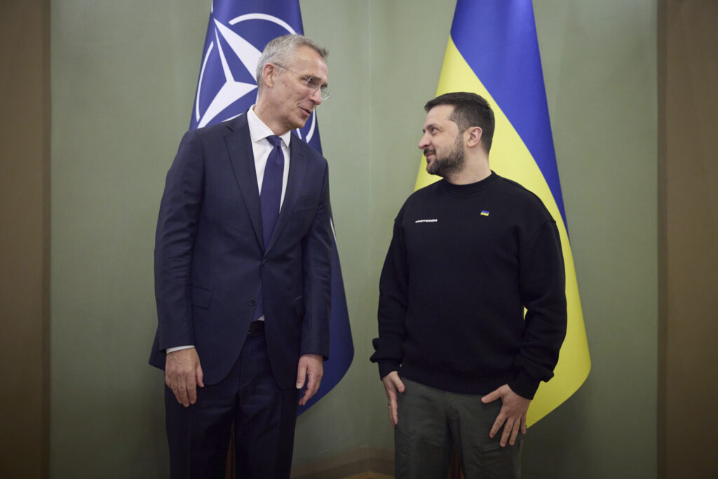NATO Secretary General Jens Stoltenberg, left, and Ukrainian President Volodymyr Zelenskyy, right, talk during their meeting in Kyiv, Ukraine, Thursday, April 20, 2023. (Ukrainian Presidential Press Office via AP)
