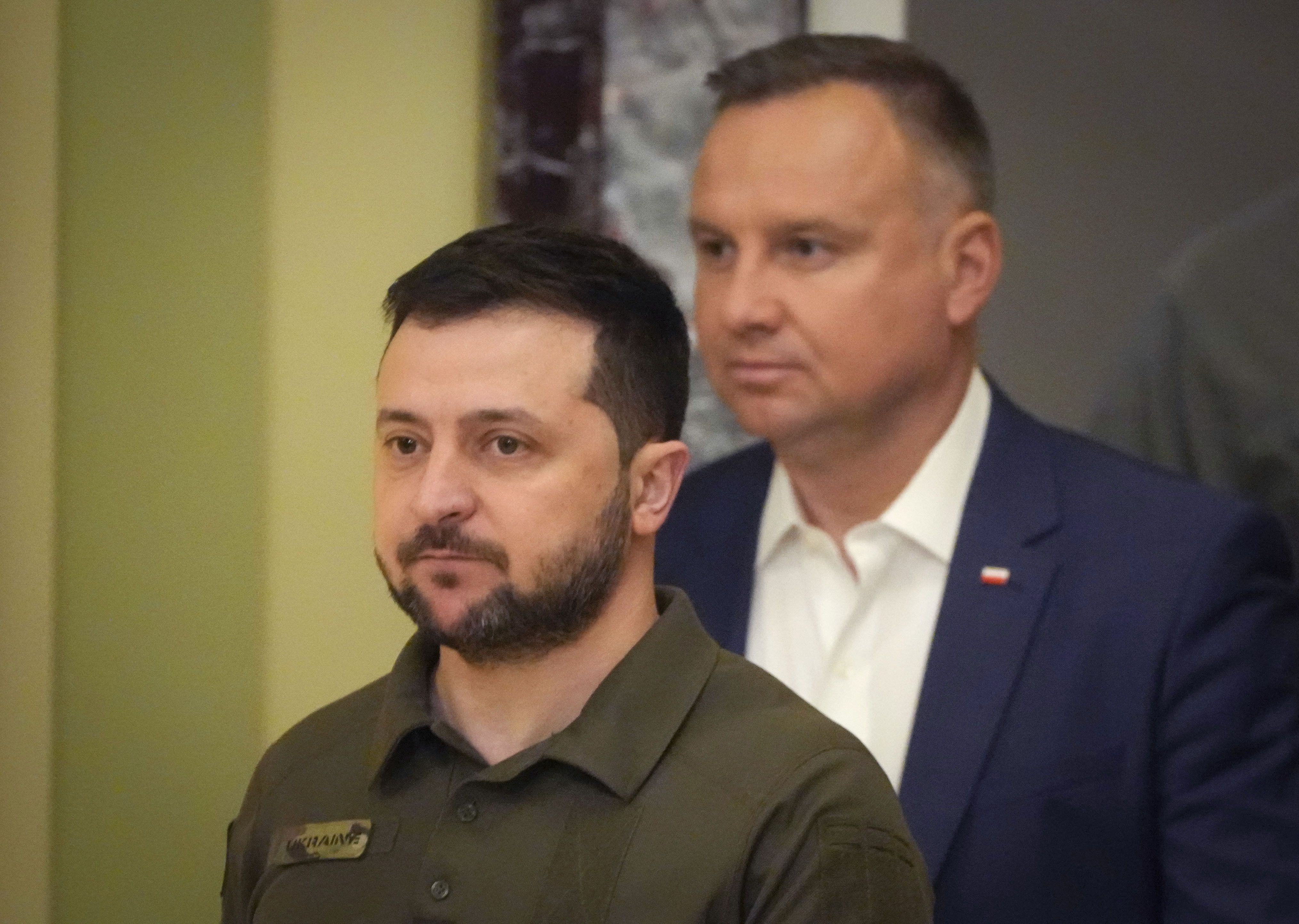 Ukrainian President Volodymyr Zelenskyy, foreground, and Polish President Andrzej Duda walk, during their meeting in Kyiv, Ukraine, Sunday, May 22, 2022. (AP Photo/Efrem Lukatsky)