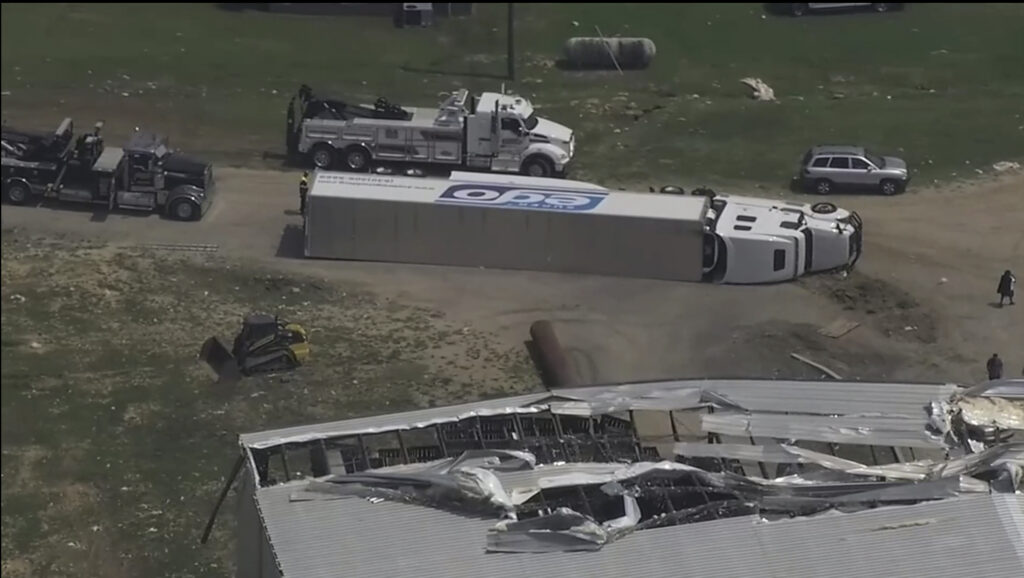 A truck is overturned and the Pfizer plant is damaged after severe weather passed the area on Wednesday, July 19, 2023 in Rocky Mount, N.C.  (WTVD via AP)