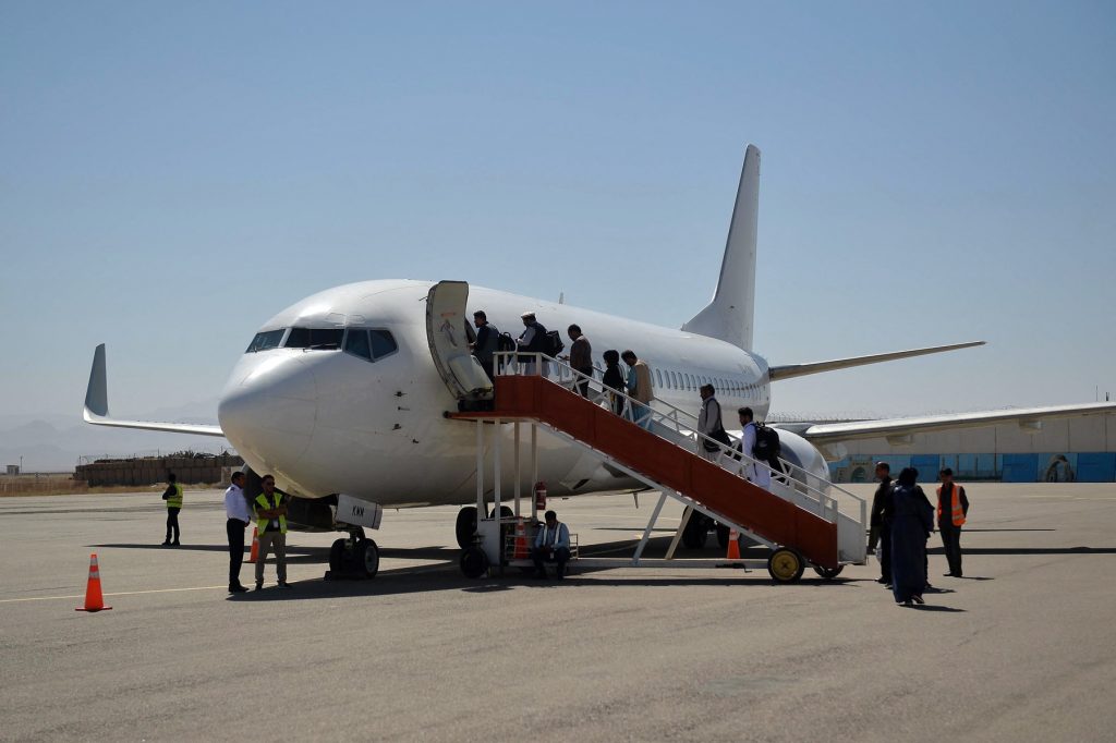 Passengers board a commercial aircraft bound to Kabul at Herat Airport on September 22, 2021.,Image: 633453670, License: Rights-managed, Restrictions: , Model Release: no, Credit line: Hoshang Hashimi / AFP / Profimedia