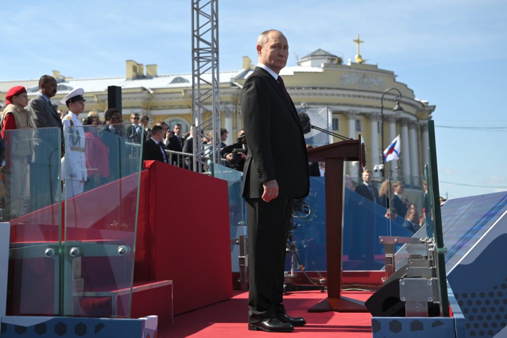 Russian President Vladimir Putin looks on, prior to the main naval parade marking Russian Navy Day in St. Petersburg, Russia, Sunday, July 30, 2023. (Alexander Kazakov, Sputnik, Kremlin Pool Photo via AP)