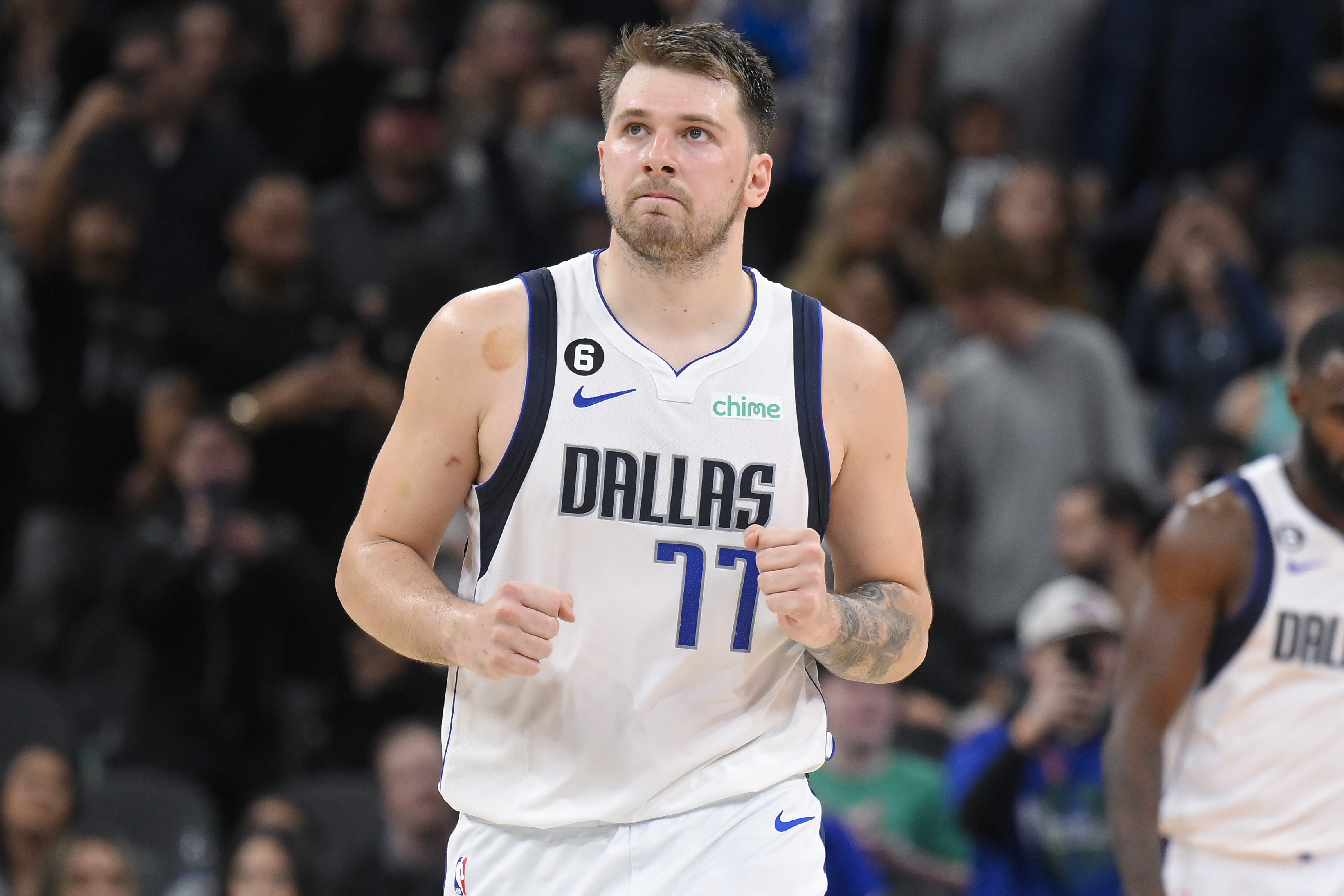 Dallas Mavericks' Luka Doncic celebrates after making a free throw during the second half of the team's NBA basketball game against the San Antonio Spurs, Saturday, Dec. 31, 2022, in San Antonio. The Mavericks won 126-125. (AP Photo/Darren Abate)