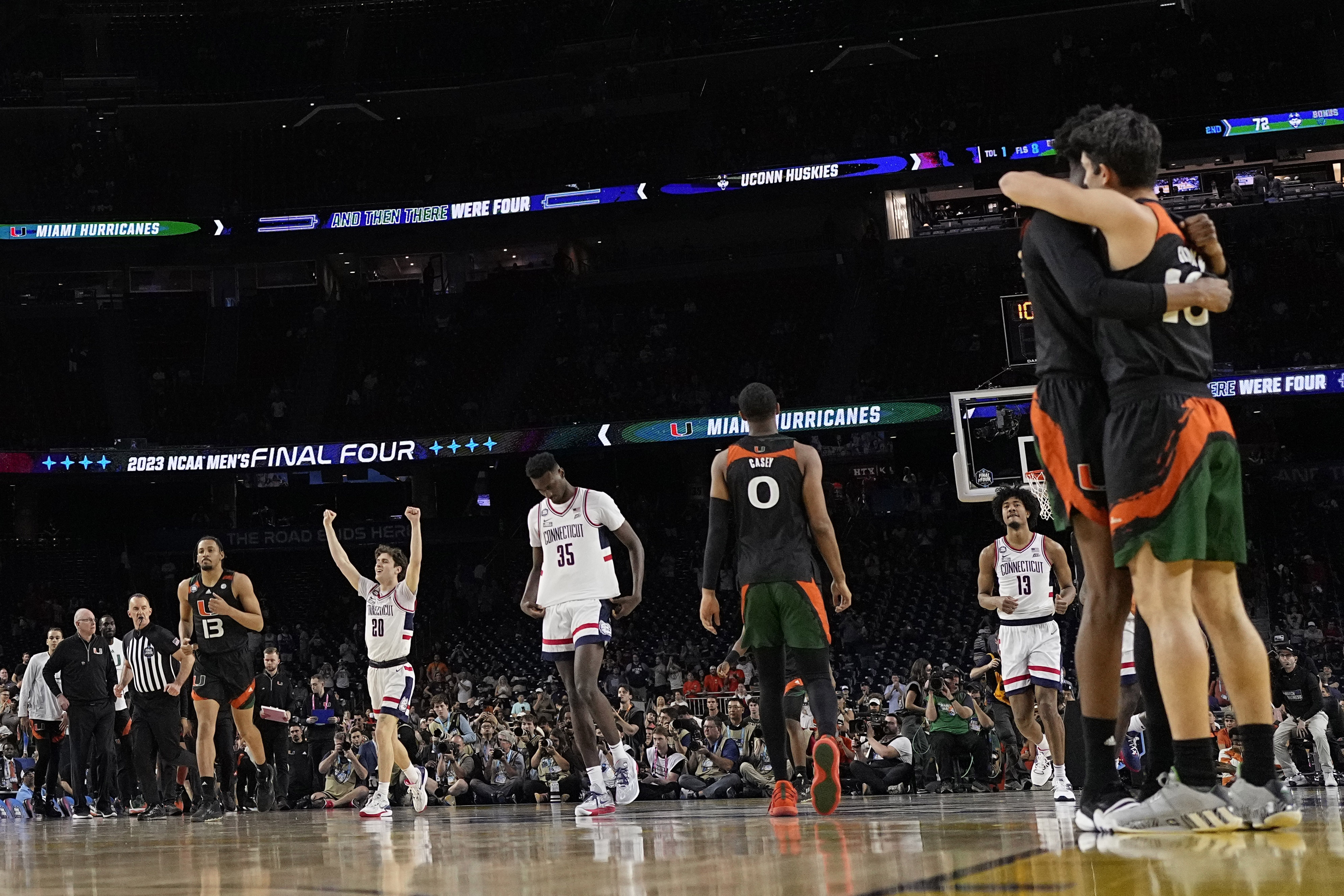 Connecticut guard Andrew Hurley (20) celebrates after scoring during their win against Miami during the second half of a Final Four college basketball game in the NCAA Tournament on Saturday, April 1, 2023, in Houston. (AP Photo/David J. Phillip)
