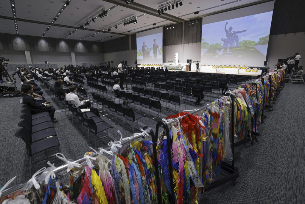 A ceremony to mark the 78th anniversary of the atomic bombing is held in Nagasaki, southern Japan Wednesday, Aug. 9, 2023. The ceremony was held indoors and scaled down due to approaching Tropical Storm Khanun. (Kyodo News via AP)