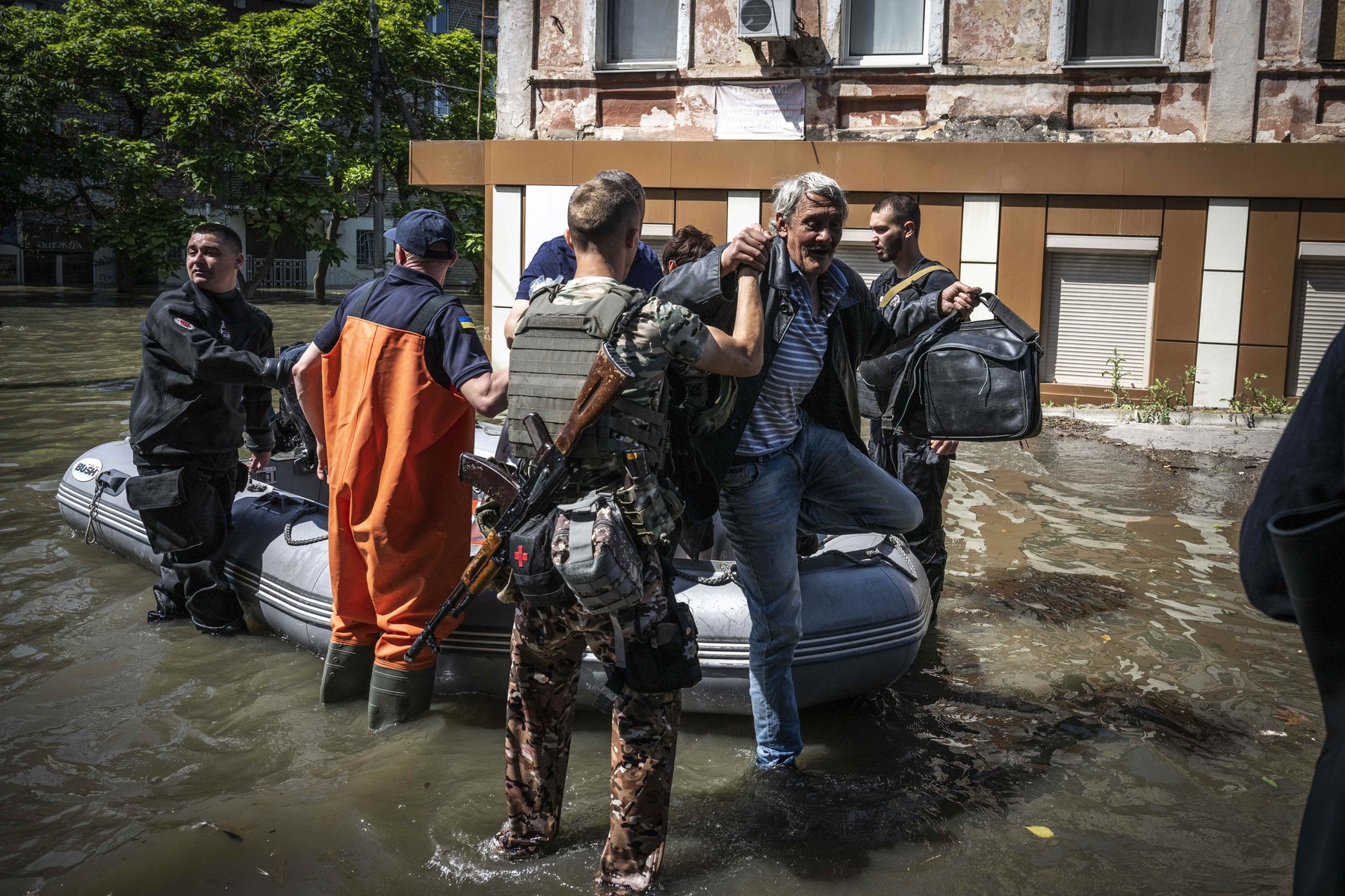 Evacuations continue in Kherson’s flooded areas after explosion at dam