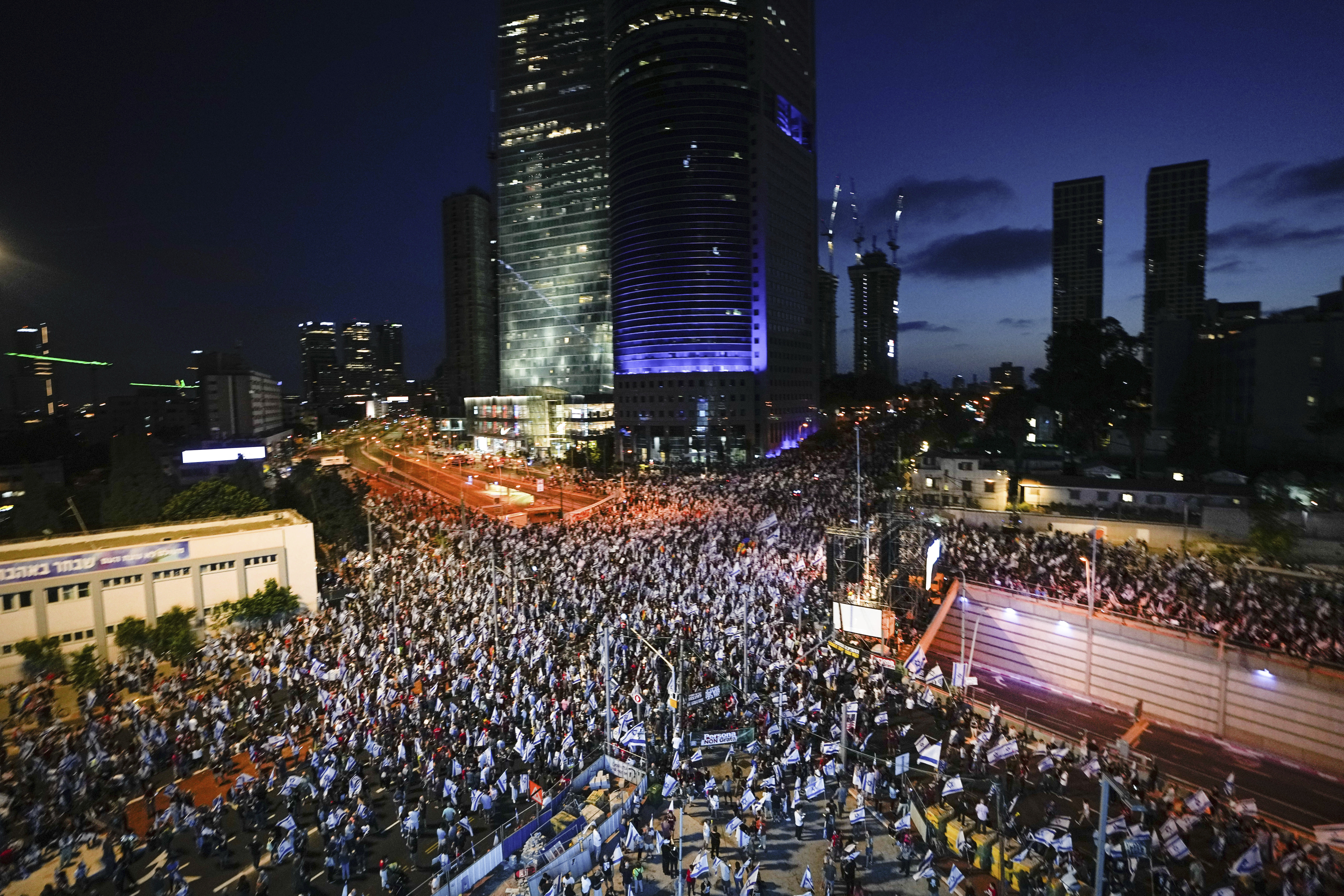 Israelis protest against plans by Prime Minister Benjamin Netanyahu's government to overhaul the judicial system in Tel Aviv, Saturday, June 3, 2023. (AP Photo/Ariel Schalit)