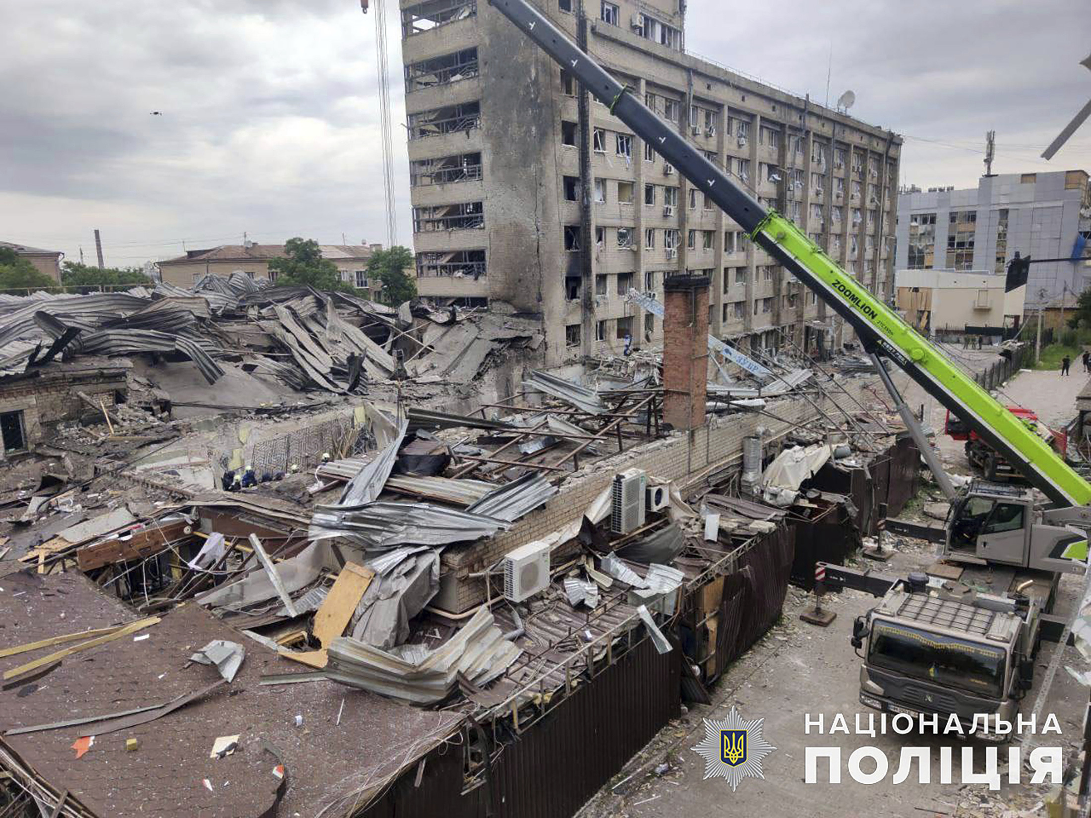 In this photo provided by the National Police of Ukraine, the RIA Pizza restaurant destroyed by a Russian attack is seen in Kramatorsk, Ukraine, Wednesday, June 28, 2023. (National Police of Ukraine via AP)