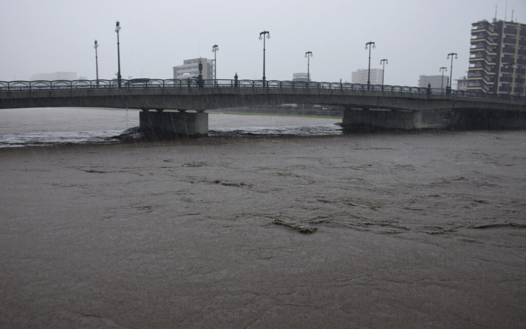 Muddy stream of the Shirakawa river rises due to heavy rain in the city of Kumamoto on July 3, 2023.,Image: 786869485, License: Rights-managed, Restrictions: Japan OUT, Model Release: no, Credit line: STR / AFP / Profimedia
