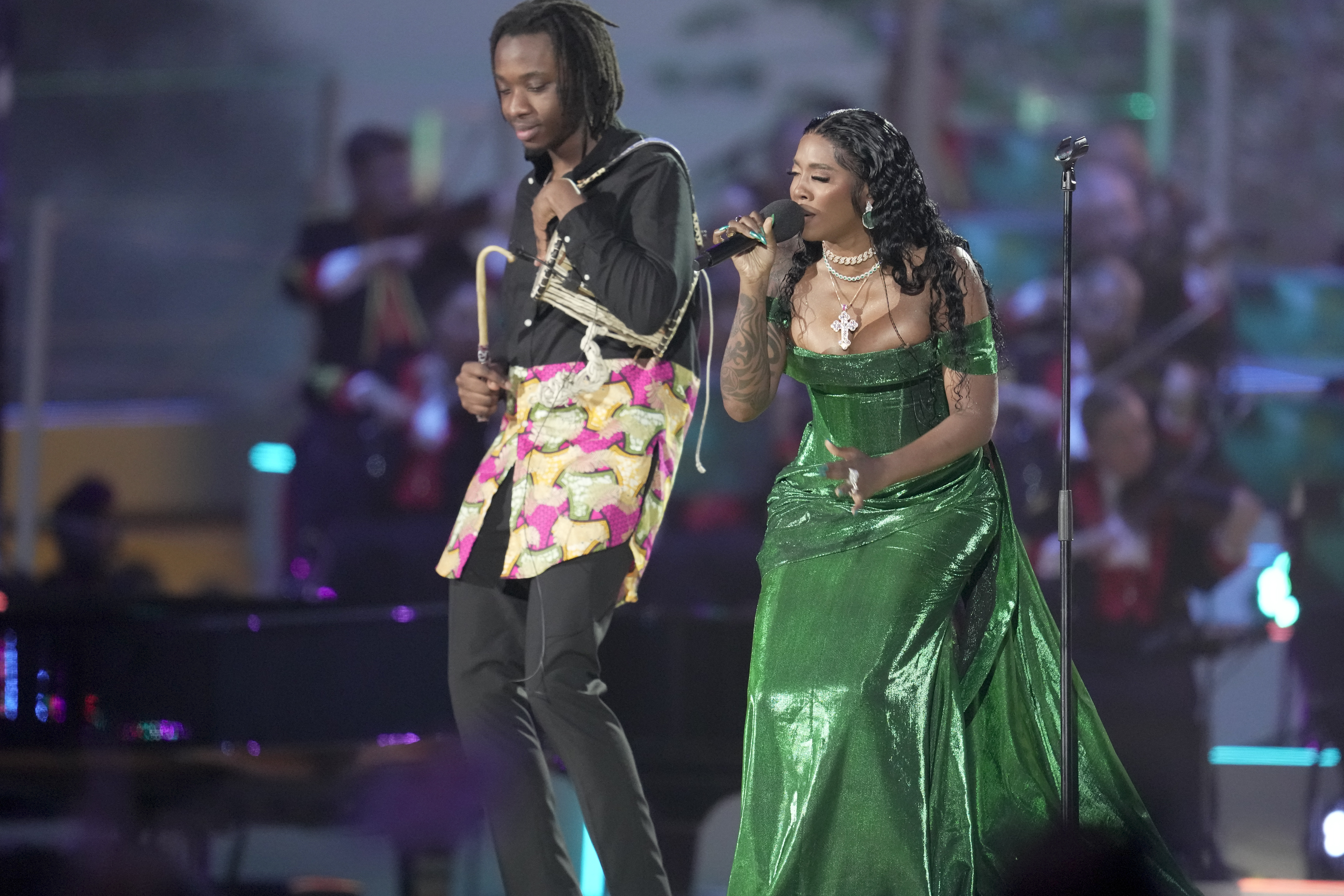 Tiwa Savage performs during a concert at Windsor Castle in Windsor, England, Sunday, May 7, 2023, celebrating the coronation of King Charles III. It's one of several events over a three-day weekend of celebrations. (AP Photo/Kin Cheung, Pool)