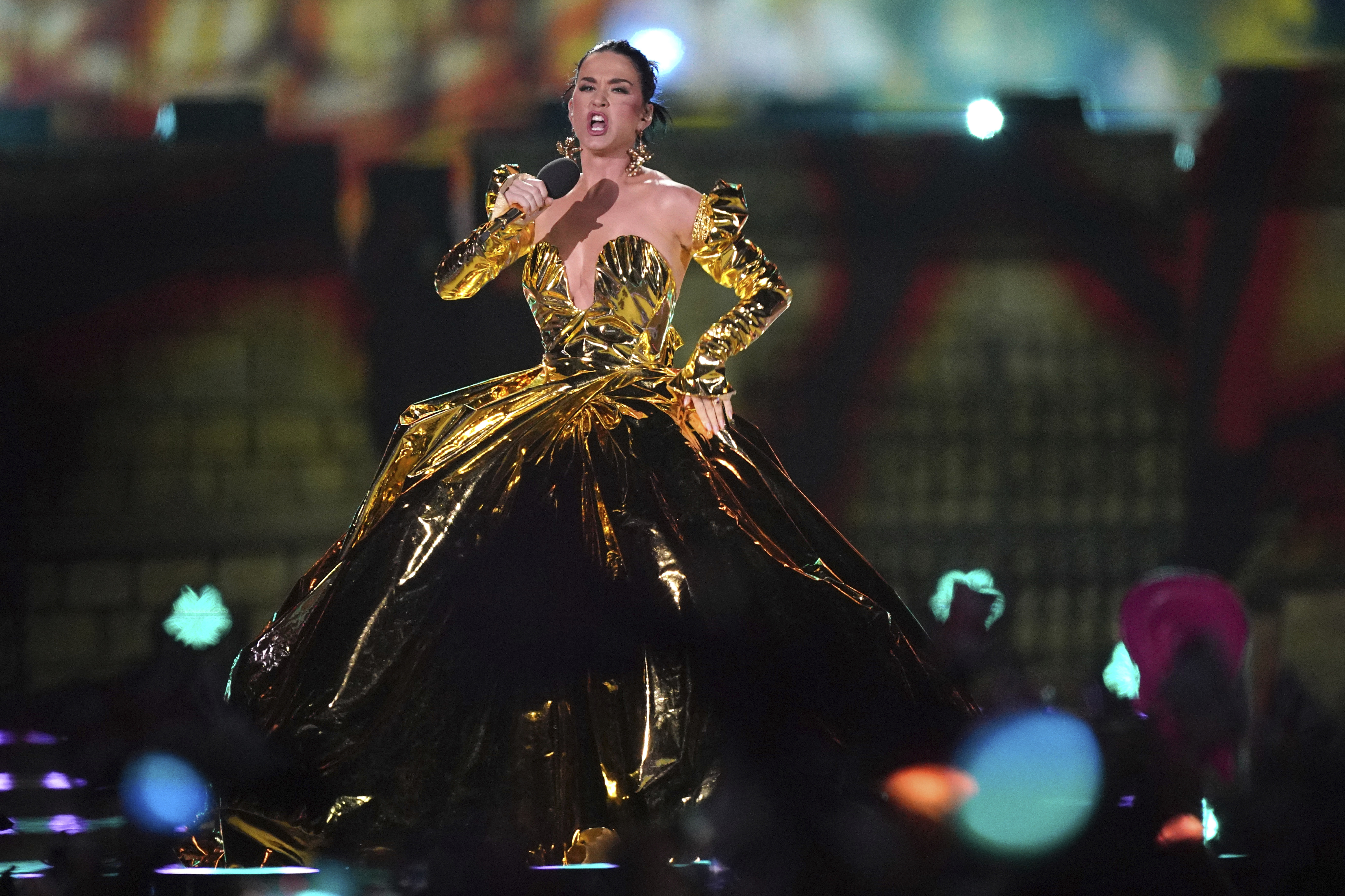 Katy Perry performs during the concert at Windsor Castle in Windsor, England, Sunday, May 7, 2023, celebrating the coronation of King Charles III. It is one of several events over a three-day weekend of celebrations. (Yui Mok/Pool Photo via AP)