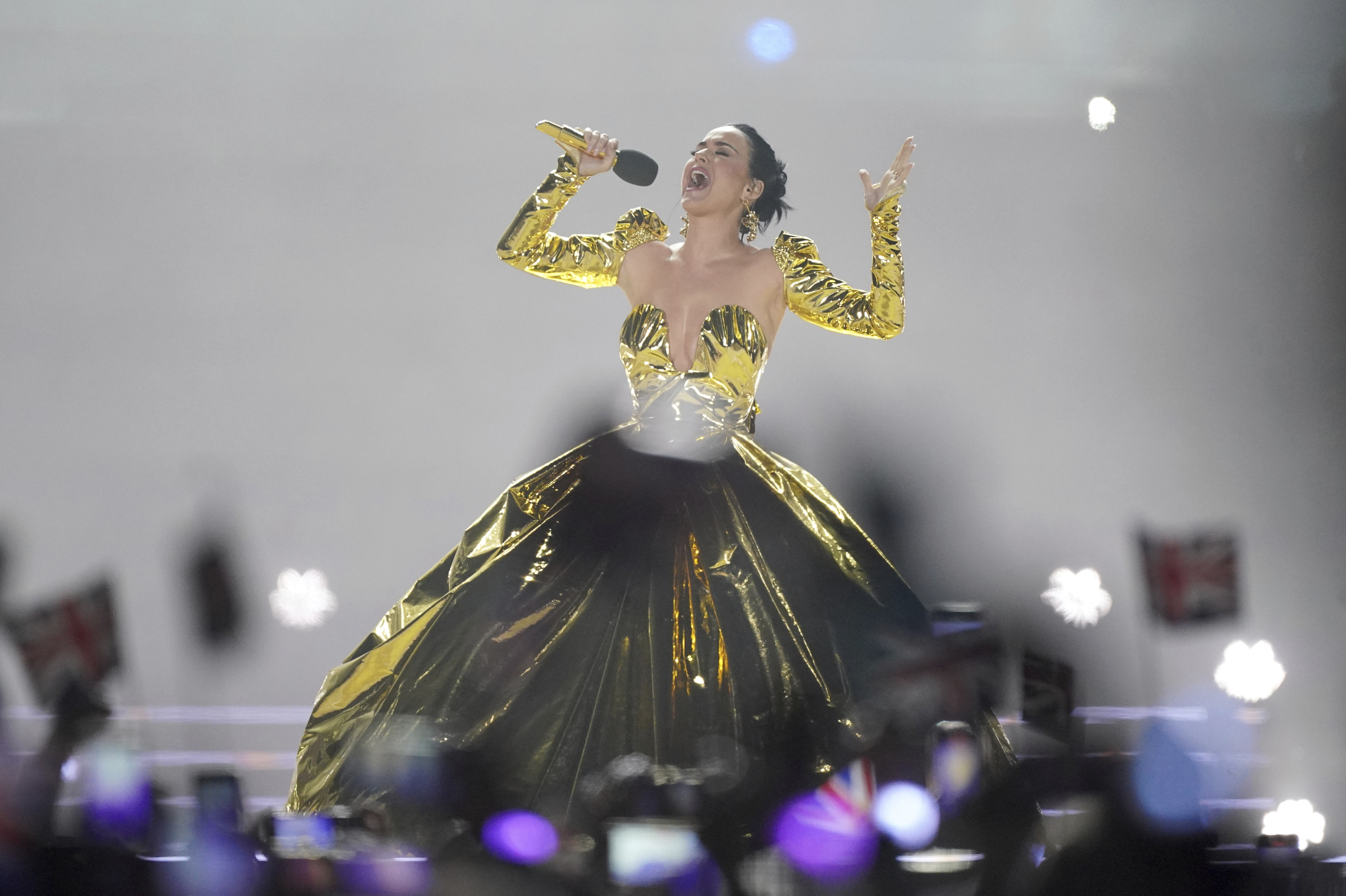 Katy Perry performs during the concert at Windsor Castle in Windsor, England, Sunday, May 7, 2023, celebrating the coronation of King Charles III. It is one of several events over a three-day weekend of celebrations. (Yui Mok/Pool Photo via AP)