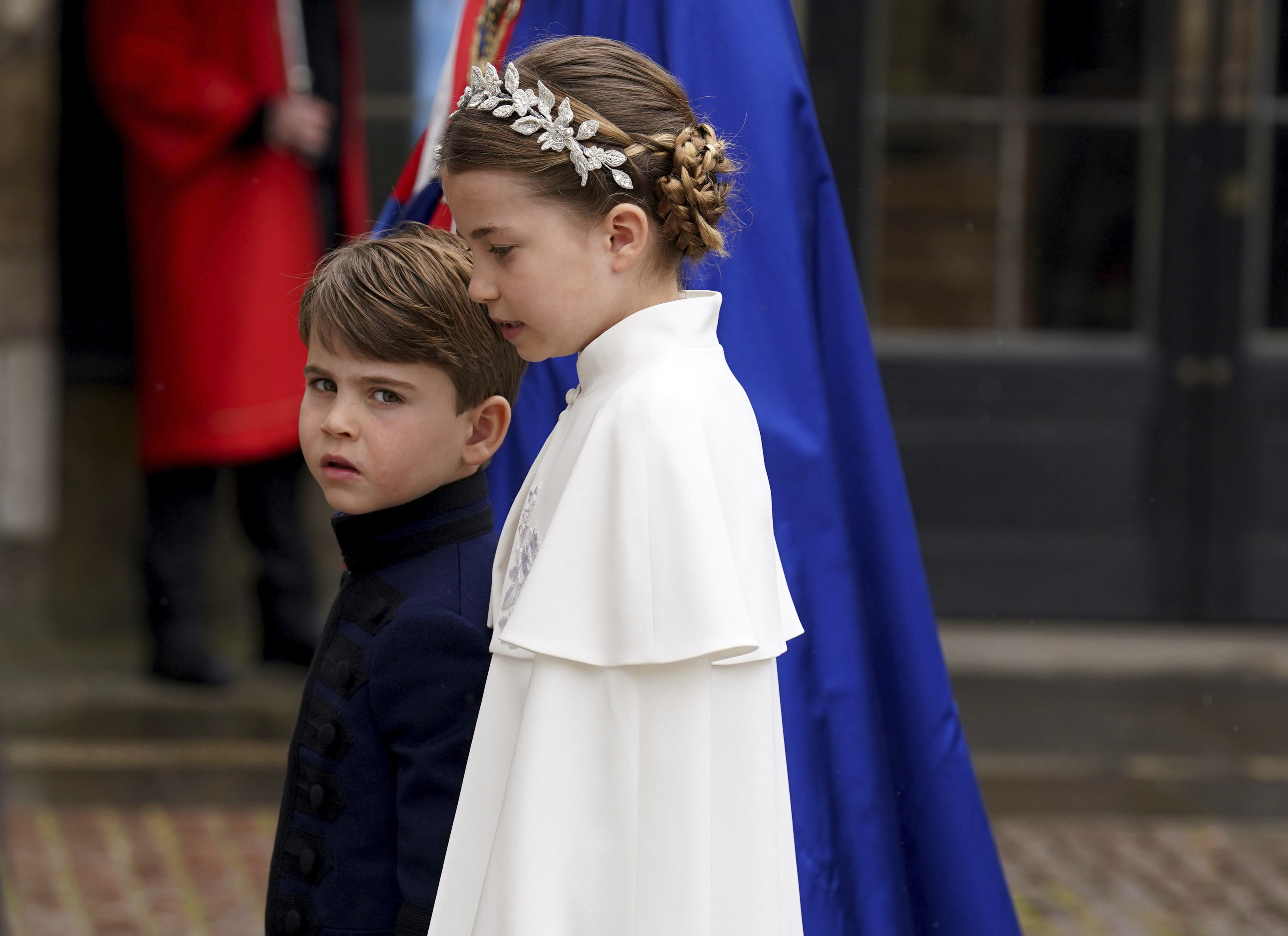 Prince Louis and Princess Charlotte arrive at Westminster Abbey ahead of the coronation of King Charles III and Camilla, the Queen Consort, in London, Saturday, May 6, 2023. (Andrew Milligan/Pool via AP)