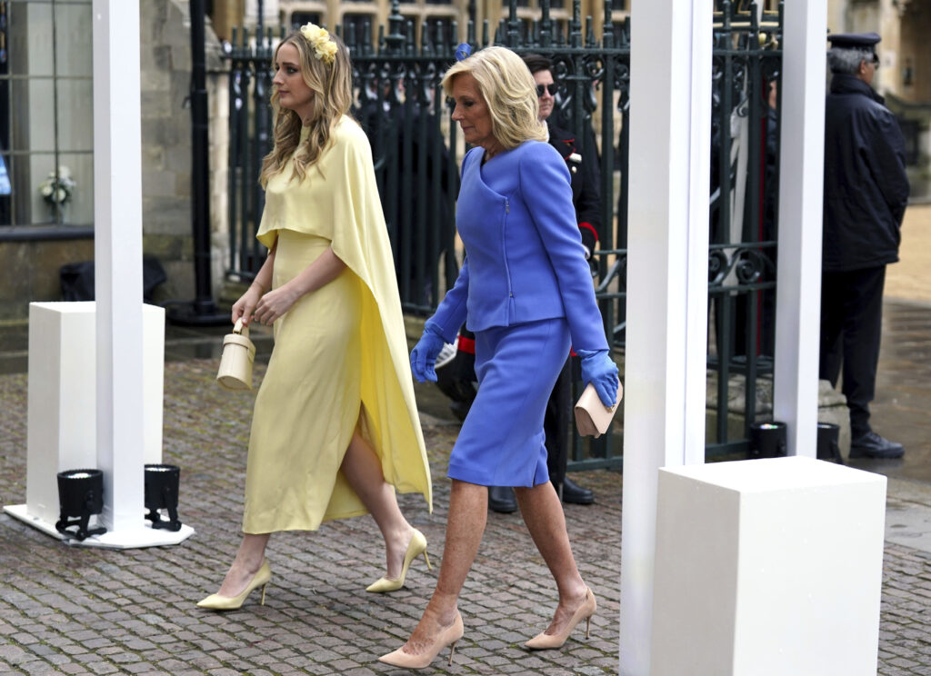 US First Lady Jill Biden and her granddaughter Finnegan arrive at Westminster Abbey ahead of the coronation of King Charles III and Camilla, the Queen Consort, in London, Saturday, May 6, 2023. (Andrew Milligan/Pool via AP)