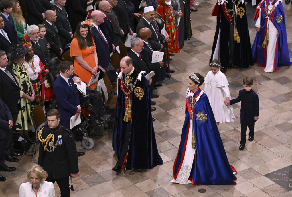 Britain's Prince William, Kate Princess of Wales, Princess Charlotte and Prince Louis leave Westminster Abbey after the coronation of King Charles III in London, Saturday, May 6, 2023. (Gareth Cattermole/Pool Photo via AP)