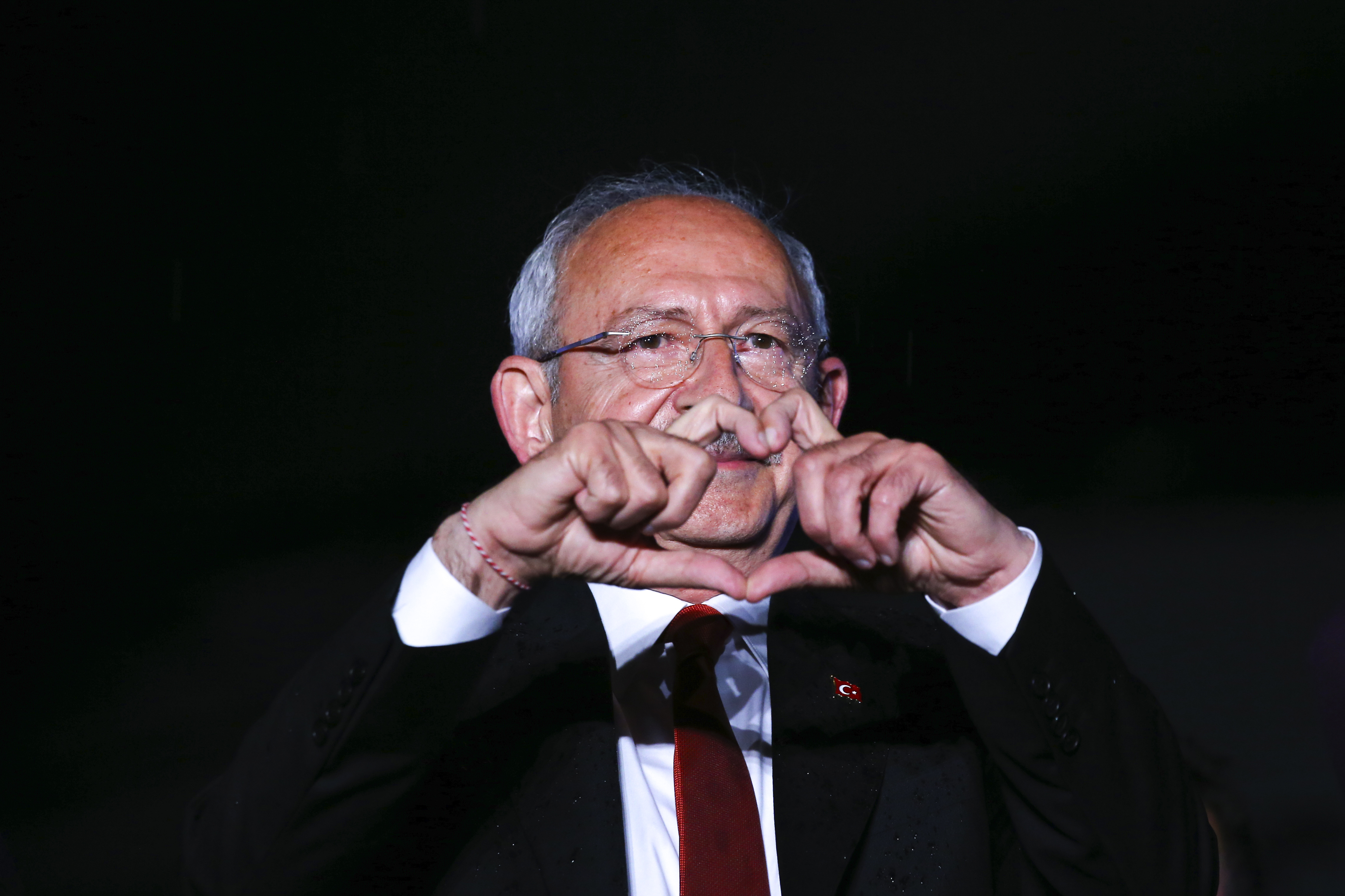 Turkish CHP party leader and Nation Alliance's presidential candidate Kemal Kilicdaroglu gestures to supporters during an election campaign rally in Ankara, Turkey, Friday, May 12, 2023. (AP Photo/Ali Unal)