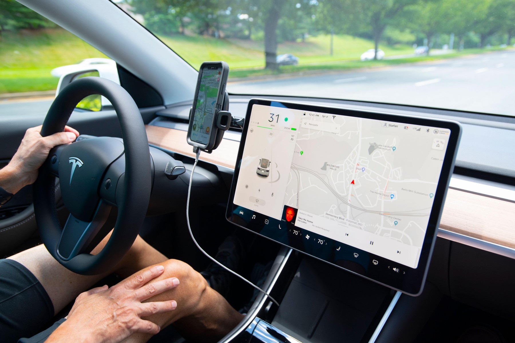 USA Maryland Tesla electric car Model Type Y SUV automobile being driven by a man