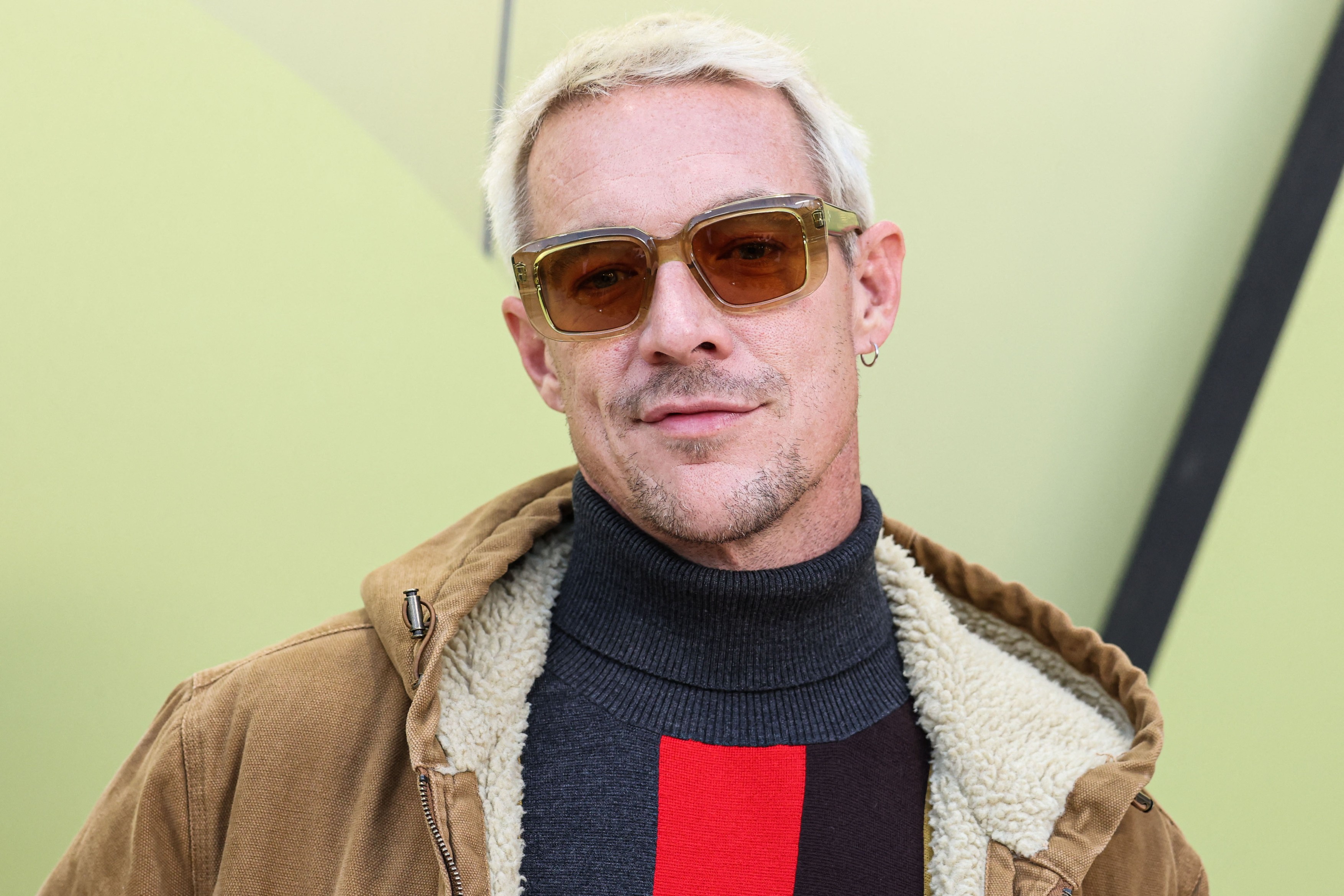 Diplo arrives at the Versace Fall/Winter 2023 Fashion Show