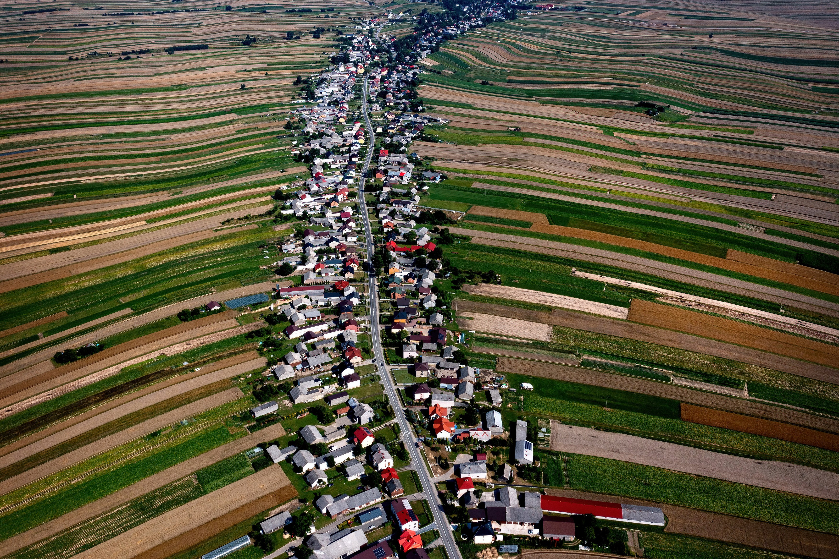 An aerial picture taken with a drone shows farmlands in Suloszowa village, southern Poland, 03 August 2022.,Image: 711775111, License: Rights-managed, Restrictions: POLAND OUT, Model Release: no, Credit line: Lukasz Gagulski / PAP / Profimedia