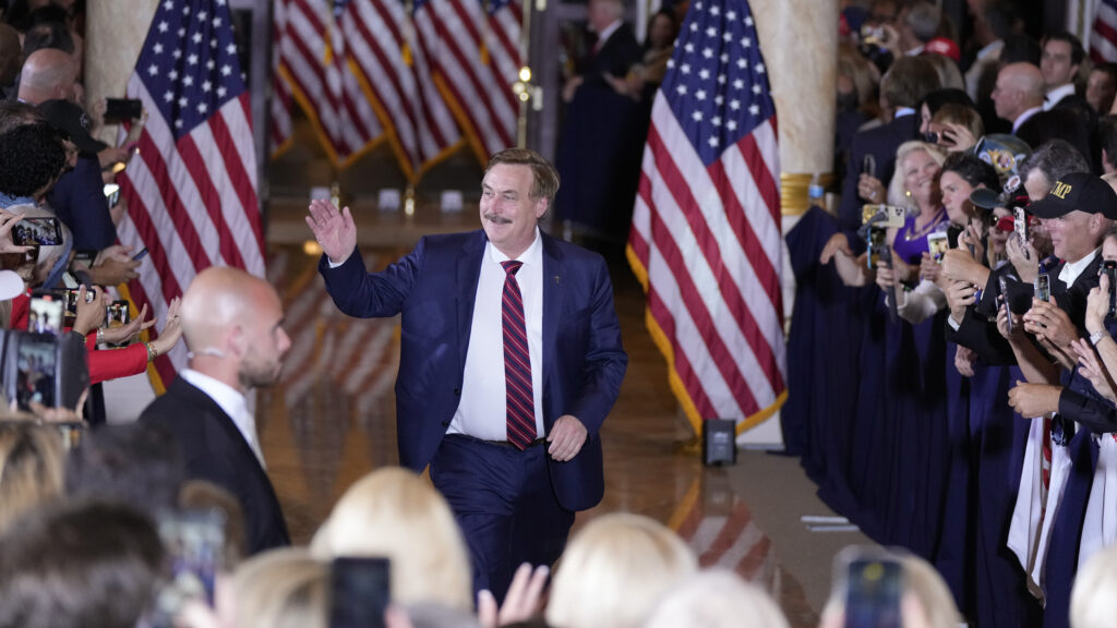 Mike Lindell, also known as the My Pillow Guy, arrives before former President Donald Trump speaks at his Mar-a-Lago estate hours after being arraigned in New York City, Tuesday, April 4, 2023, in Palm Beach, Fla. (AP Photo/Rebecca Blackwell)