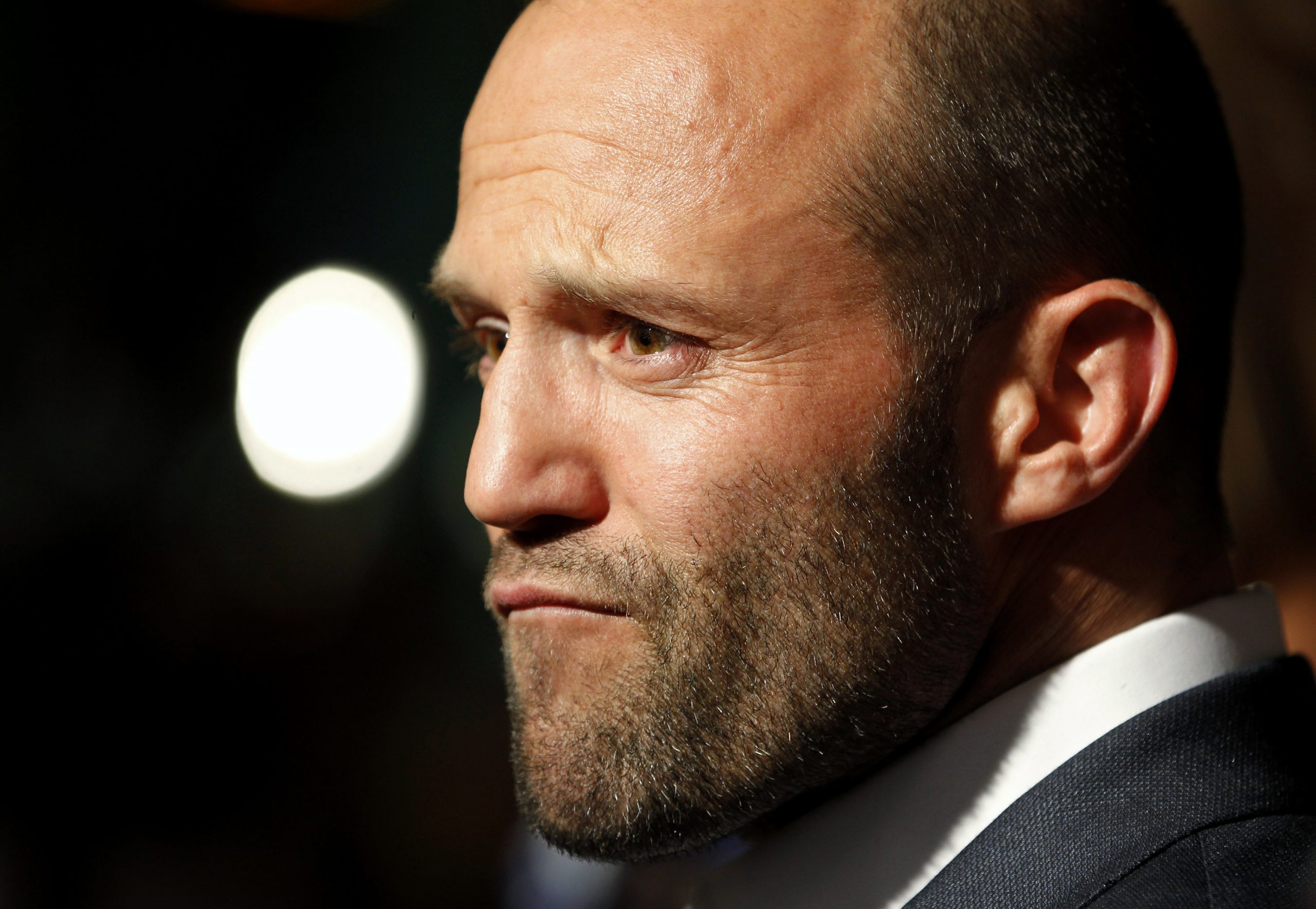 Cast member Jason Statham is interviewed at the premiere of his film "The Mechanic" in Hollywood, California January 25, 2011. REUTERS/Fred Prouser (UNITED STATES - Tags: ENTERTAINMENT) - GM1E71Q136101