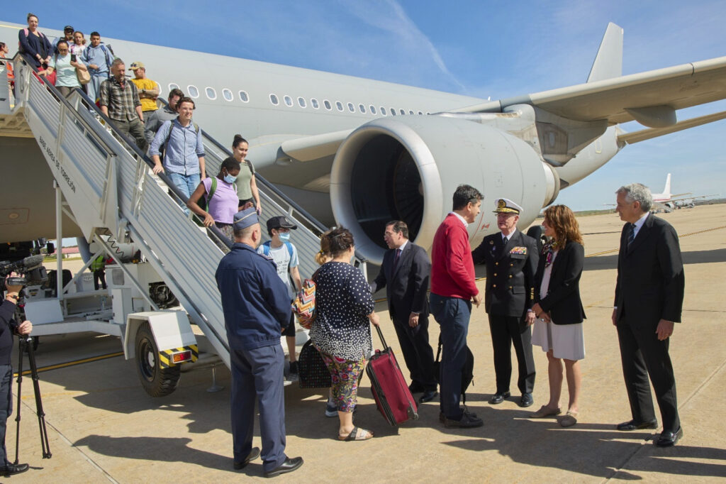 In this photo provided by the Spanish Defence Ministry passengers arriving from Sudan disembark a Spanish Air Force aircraft at Torrejón Air Base on Monday April 24, 2023. (Spanish Defence Ministry via AP)
