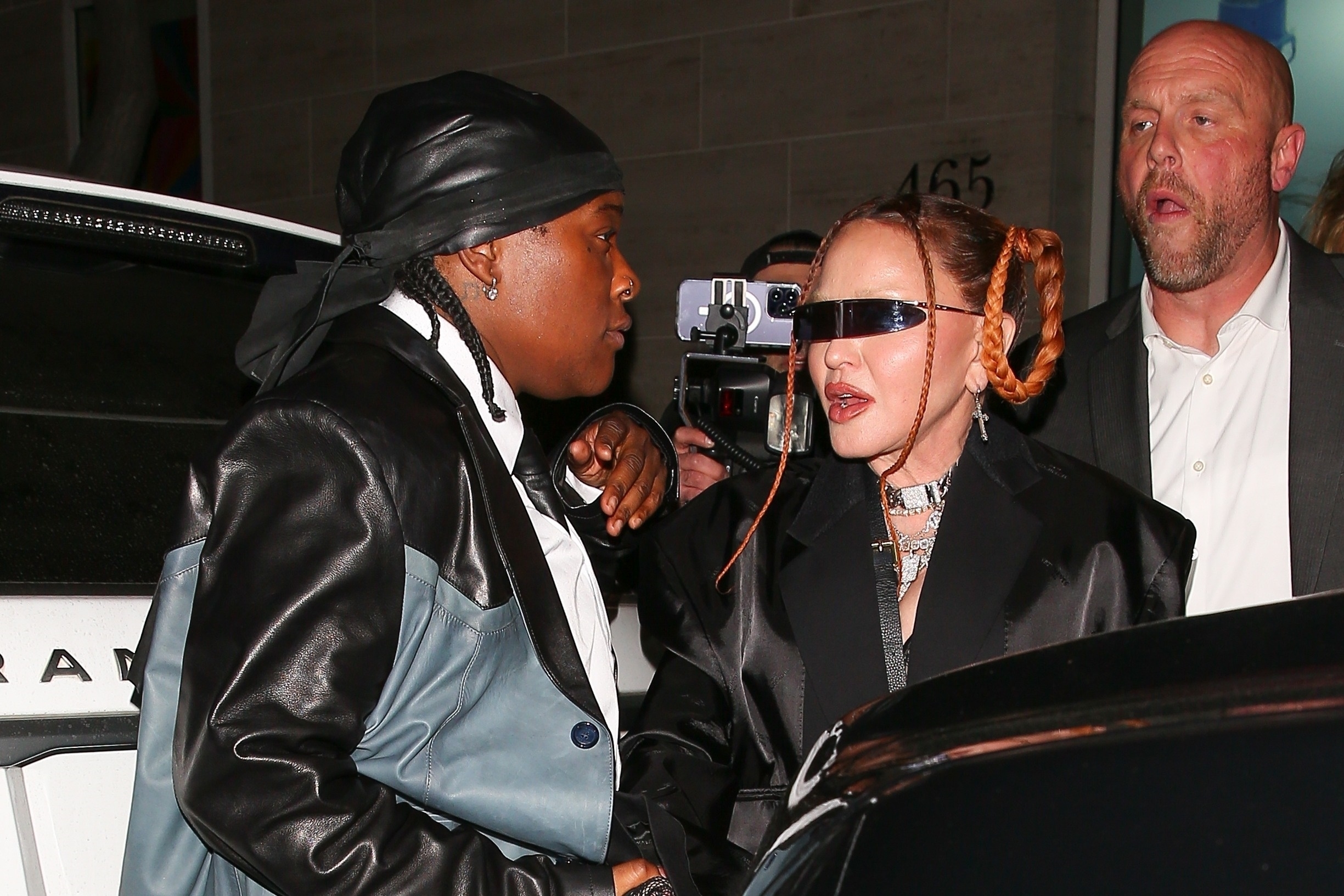 Popstar Madonna says bye to friends after attending Mr. Brainwash's event