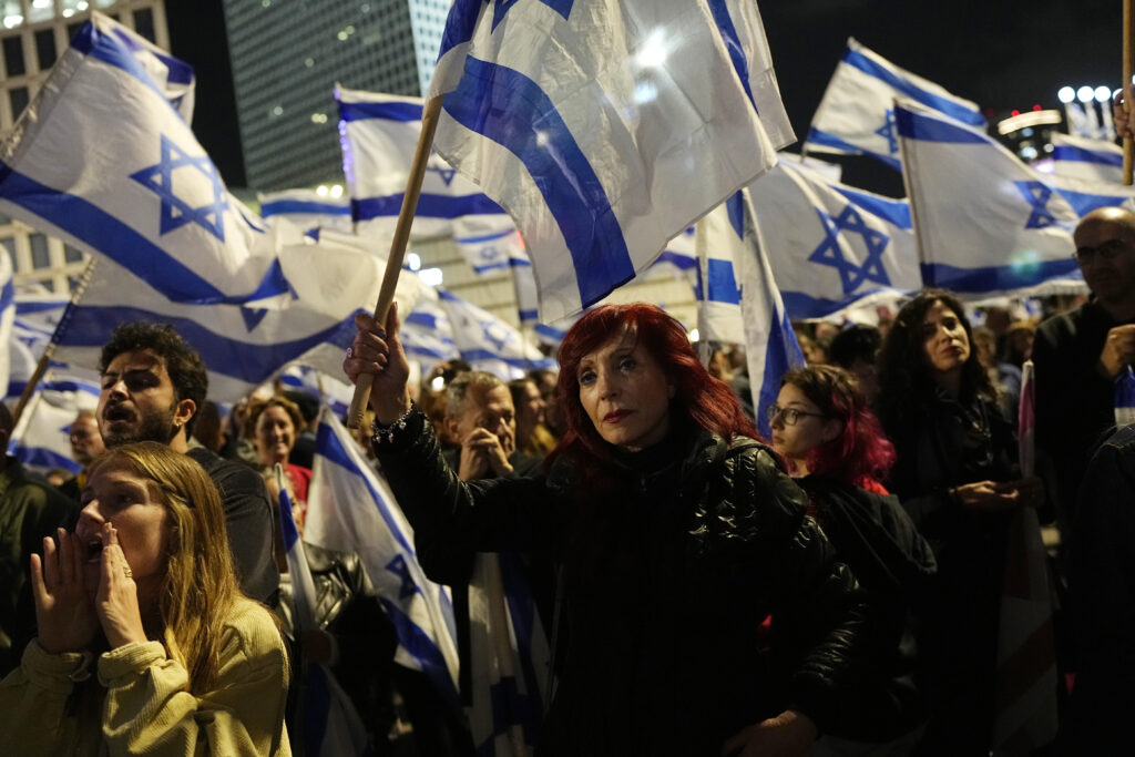 Israelis protest against plans by Prime Minister Benjamin Netanyahu's far-right government to overhaul the judicial system, in Tel Aviv, Israel, Saturday, April 29, 2023. (AP Photo/Ohad Zwigenberg)