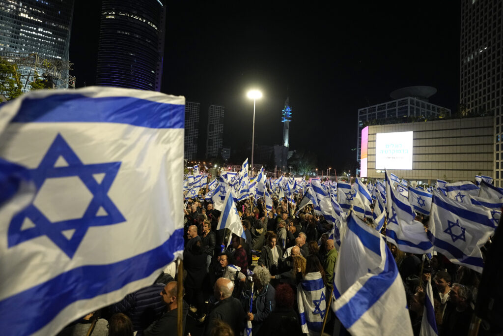 Israelis protest against plans by Prime Minister Benjamin Netanyahu's far-right government to overhaul the judicial system, in Tel Aviv, Israel, Saturday, April 29, 2023. (AP Photo/Ohad Zwigenberg)