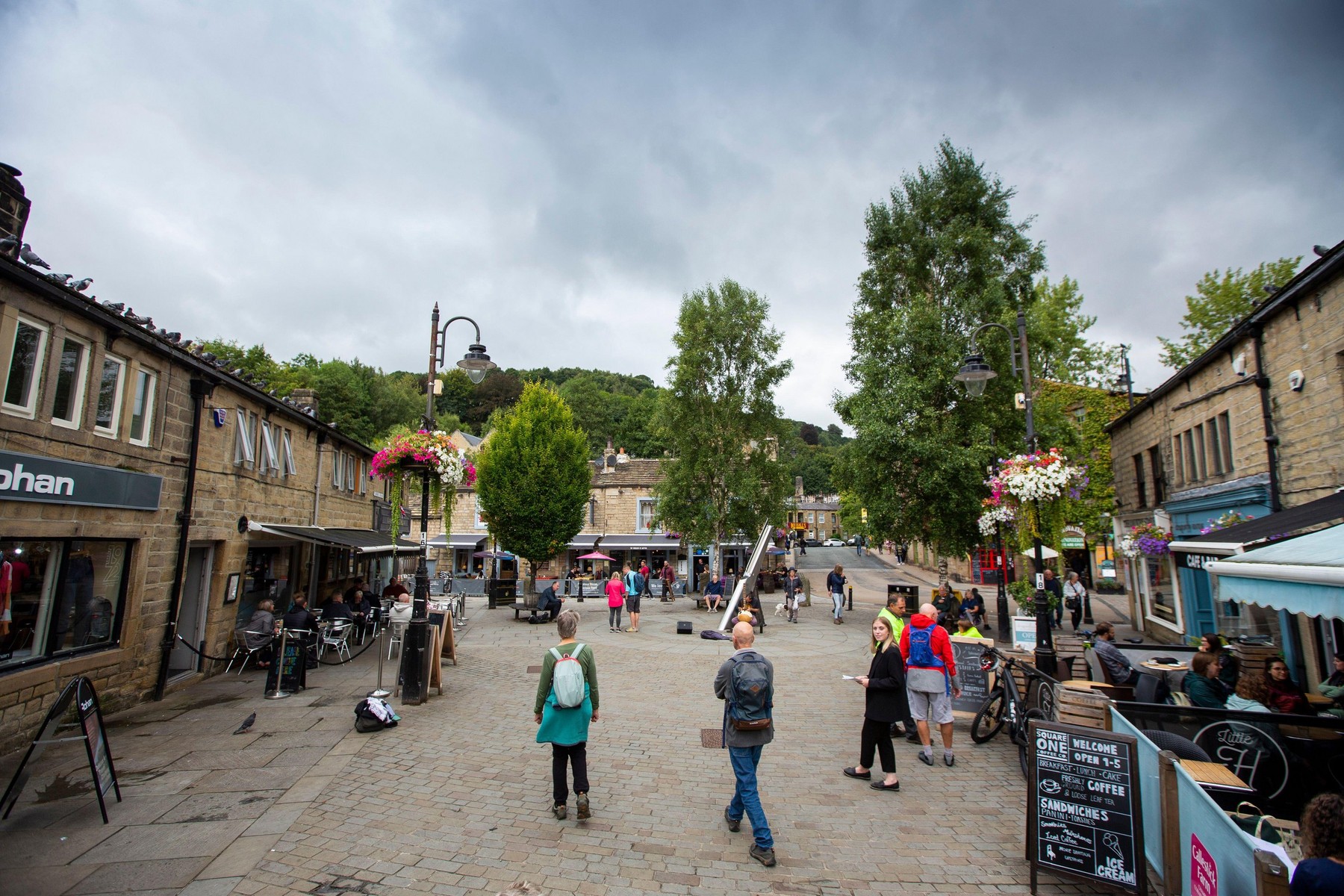 Hebden Bridge is a market town in the Upper Calder Valley in West Yorkshire, England. It is 8 miles west of Halifax and 14 miles north-east of Rochdale, at the confluence of the River Calder and the Hebden Water with the Rochdale canal running through it.
