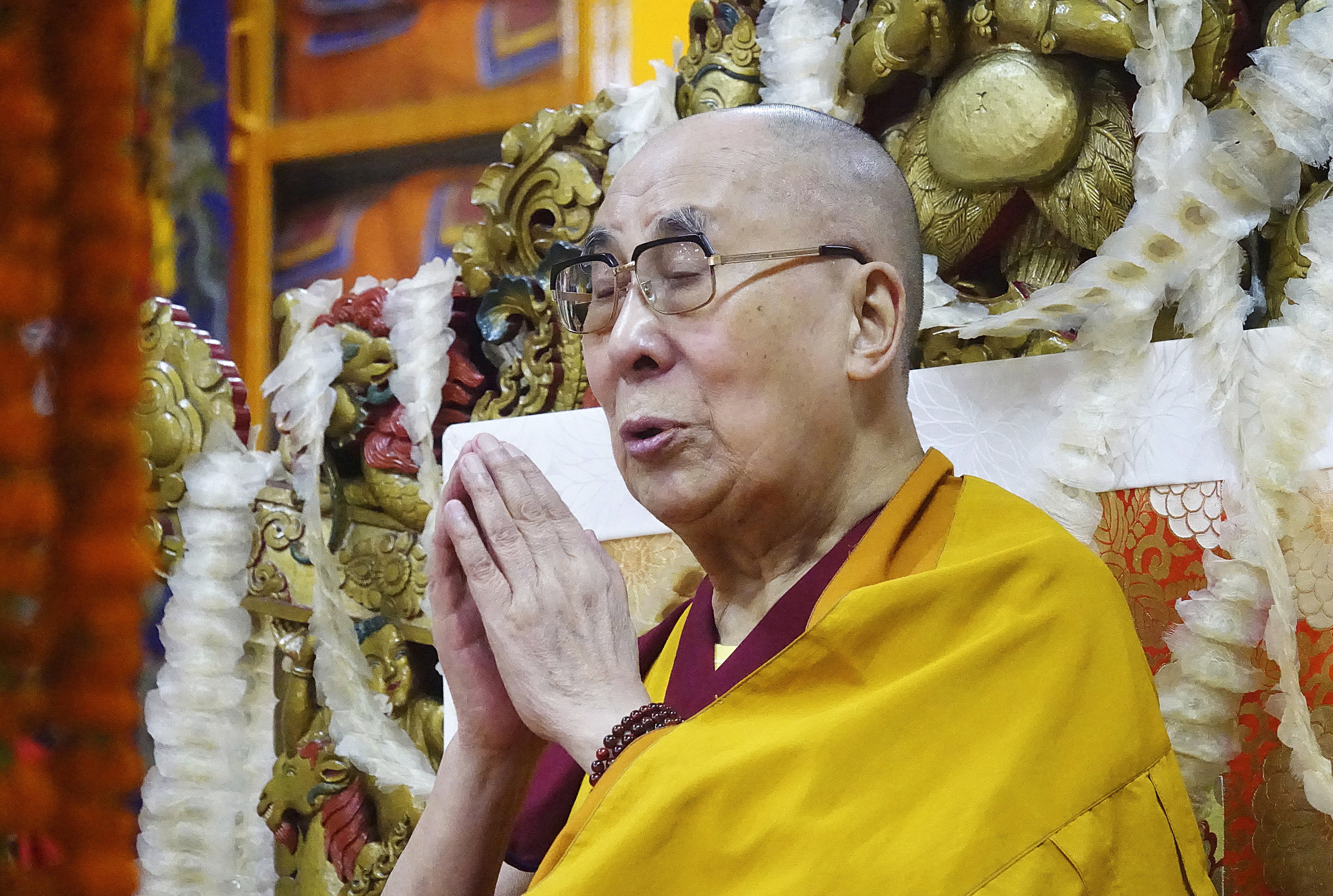 Tibetan spiritual leader Dalai Lama attends a Long Life prayer offering, at the Tsuglagkhang Buddhist temple of