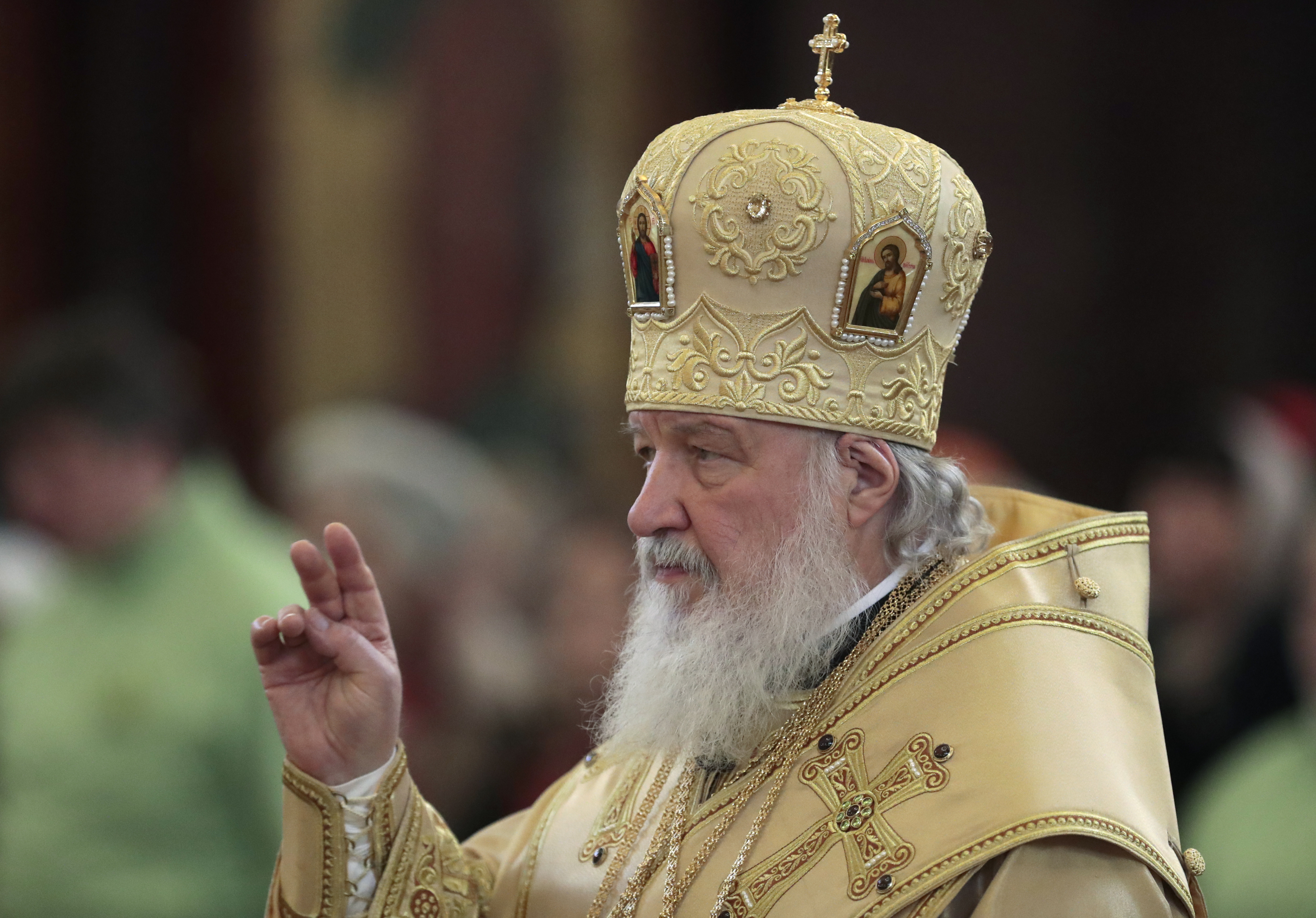 Disabled persons with their patrons pray at Christ the Savior Cathedral in Moscow