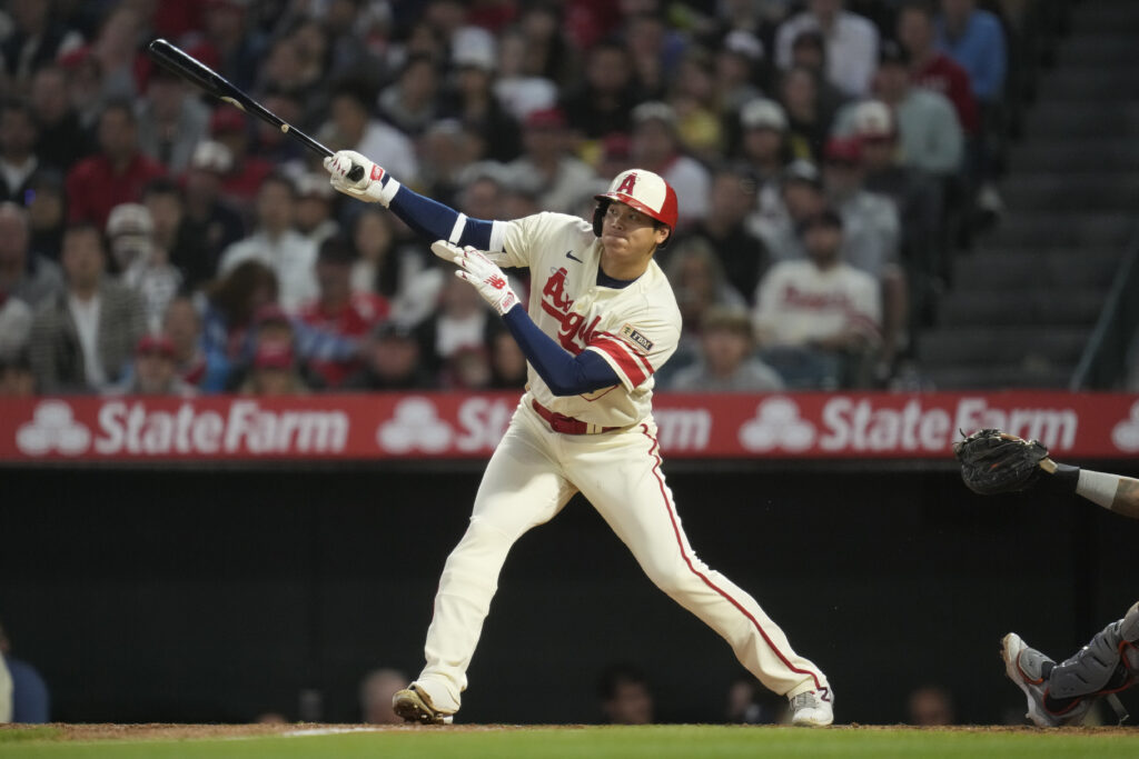 Los Angeles Angels' Shohei Ohtani (17) lines out during the fourth inning of a baseball game against the Houston Astros in Anaheim, Calif., Tuesday, May 9, 2023. (AP Photo/Ashley Landis)
