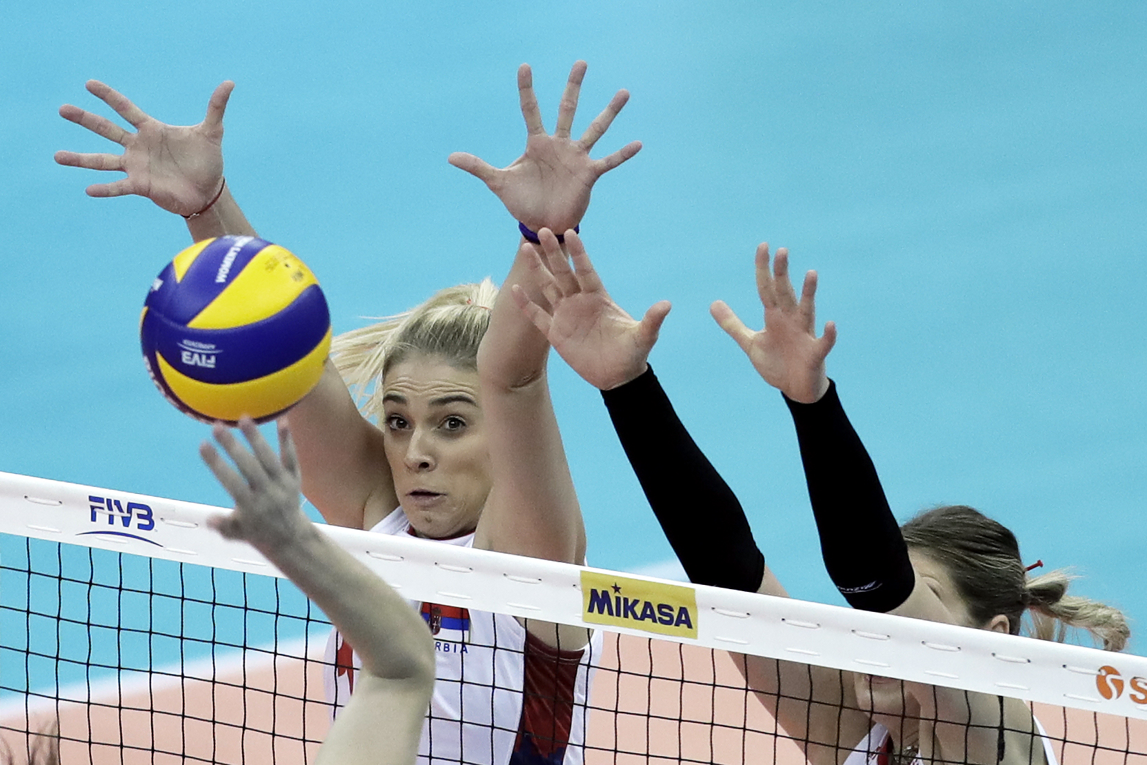 epa07085263 Jovana Stevanovic (L) and Bianka Busa of Serbia jump to block the ball during the FIVB Women's World Championship second round Pool E match between the Netherlands and Serbia in Nagoya, central Japan, 11 October 2018.  EPA-EFE/KIYOSHI OTA