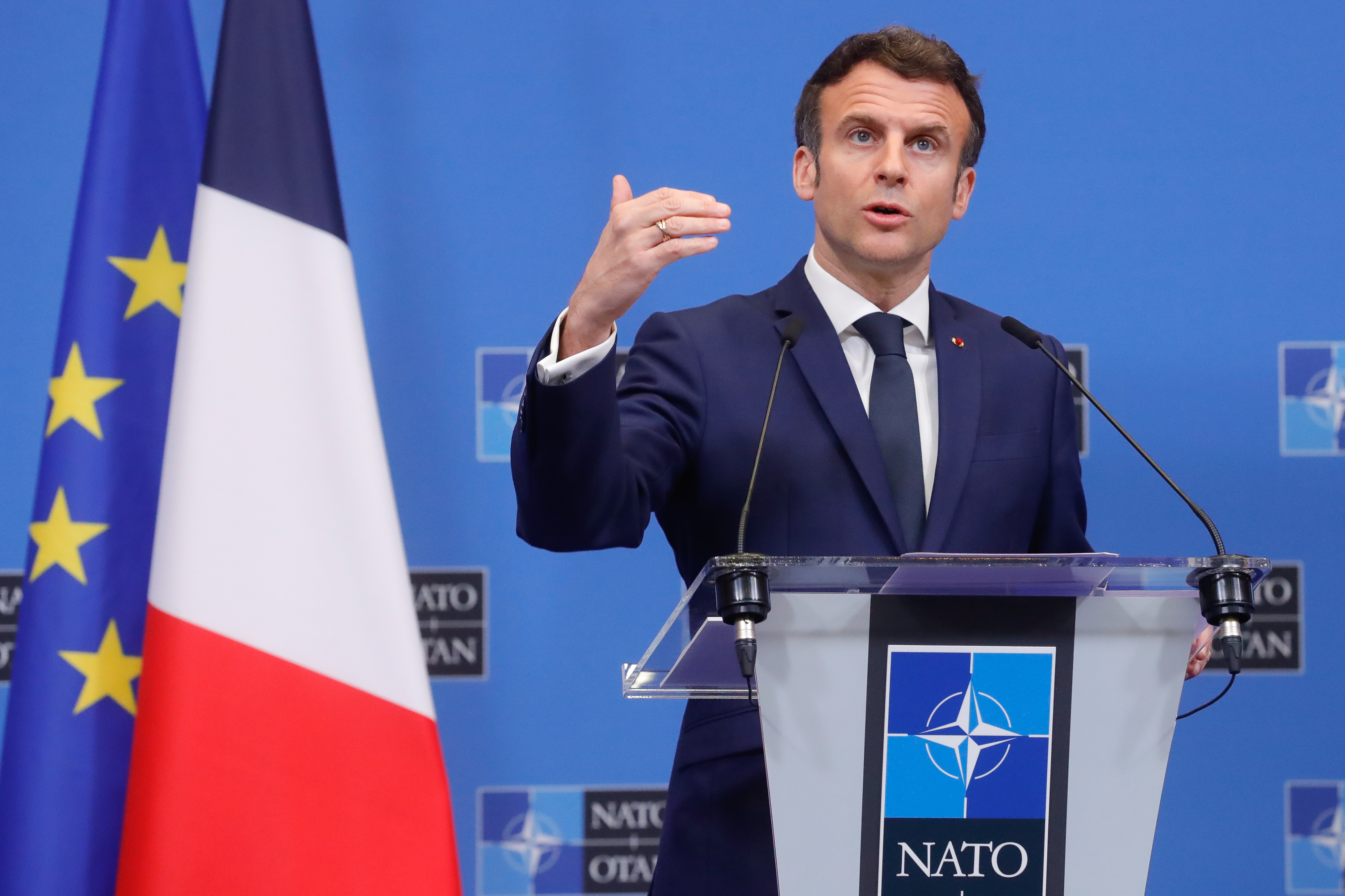 epa09846790 French President Emmanuel Macron gives a press conference at the end of a G7 meeting at the Alliance headquarters in Brussels, Belgium, 24 March 2022.  EPA-EFE/STEPHANIE LECOCQ