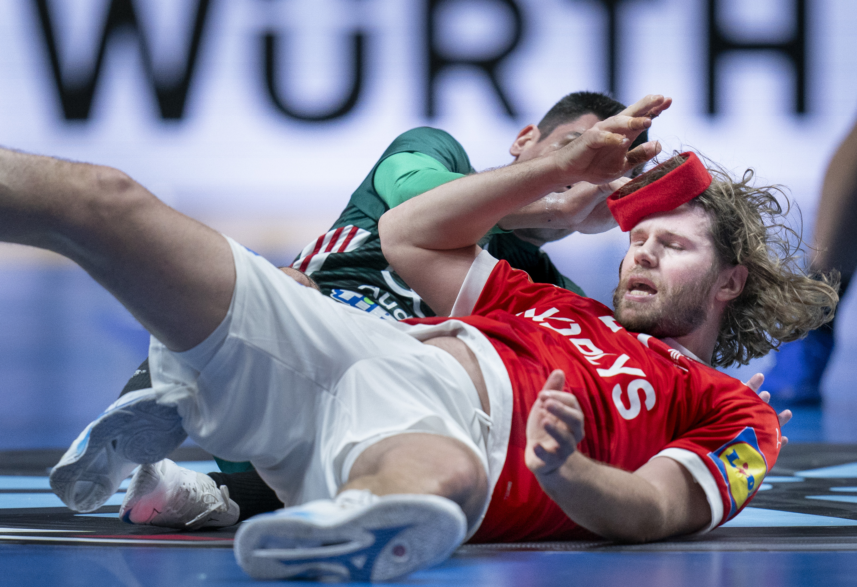 epa10429527 Denmark's Mikkel Hansen during the IHF Men's World Championship handball quarter final between Denmark and Hungary, in Stockholm, Sweden, 25 January 2023.  EPA-EFE/Liselotte Sabroe DENMARK OUT