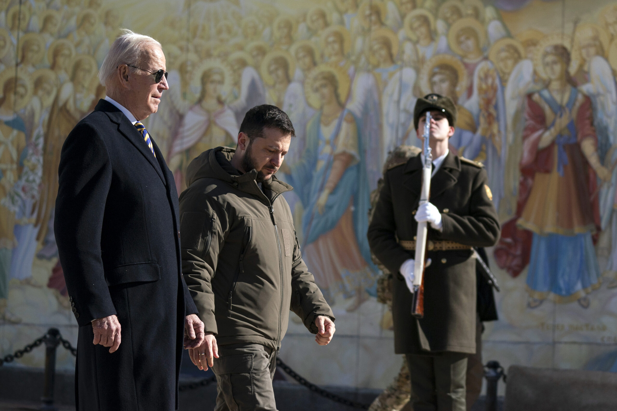 US President Joe Biden, left, walks with Ukrainian President Volodymyr Zelenskyy at St. Michael's Golden-Domed Cathedral during an unannounced visit, in Kyiv, Ukraine, Monday, Feb. 20, 2023. (AP Photo/Evan Vucci)