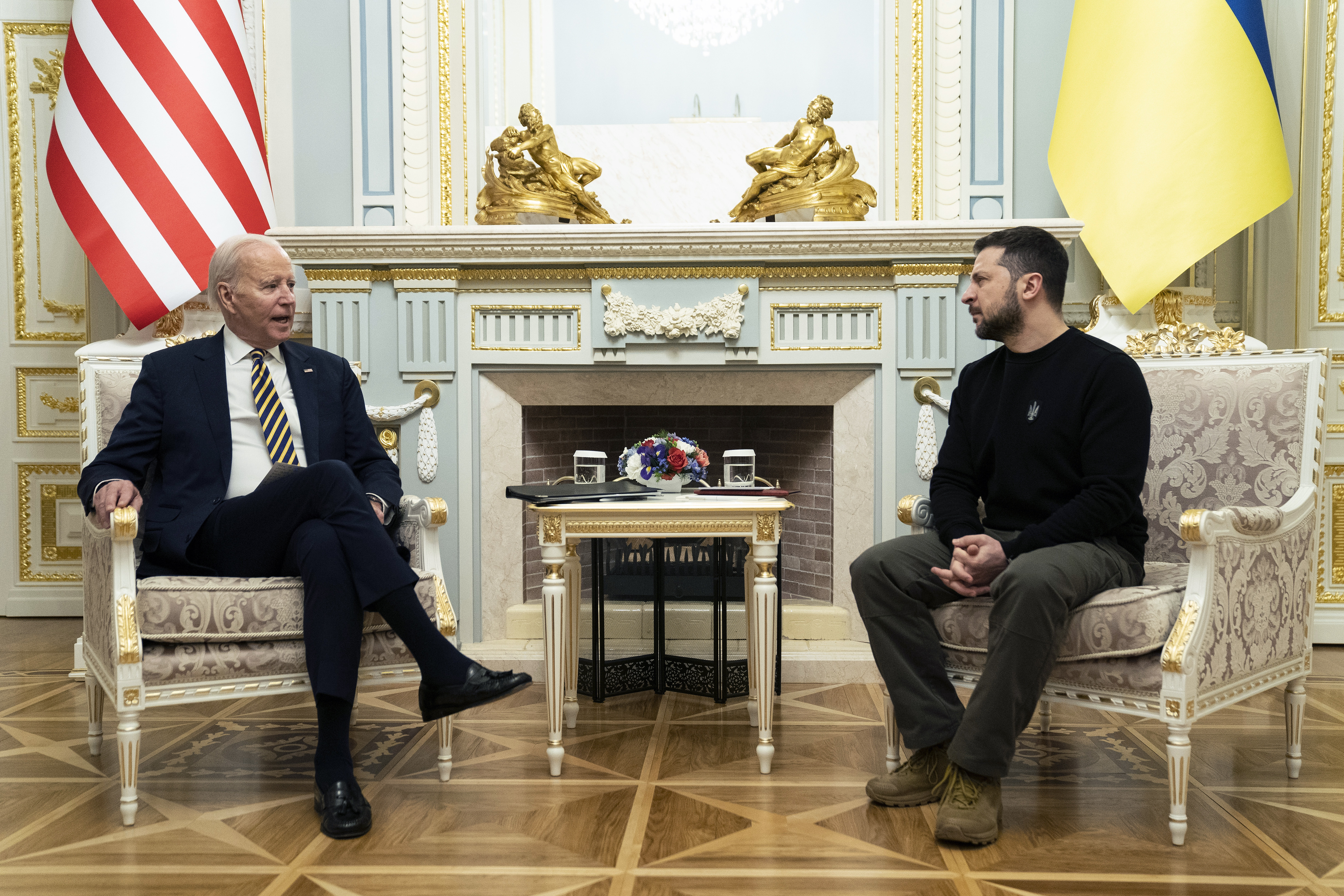 US President Joe Biden, left, meets with Ukrainian President Volodymyr Zelenskyy at Mariinsky Palace during an unannounced visit in Kyiv, Ukraine, Monday, Feb. 20, 2023. (AP Photo/Evan Vucci, Pool)