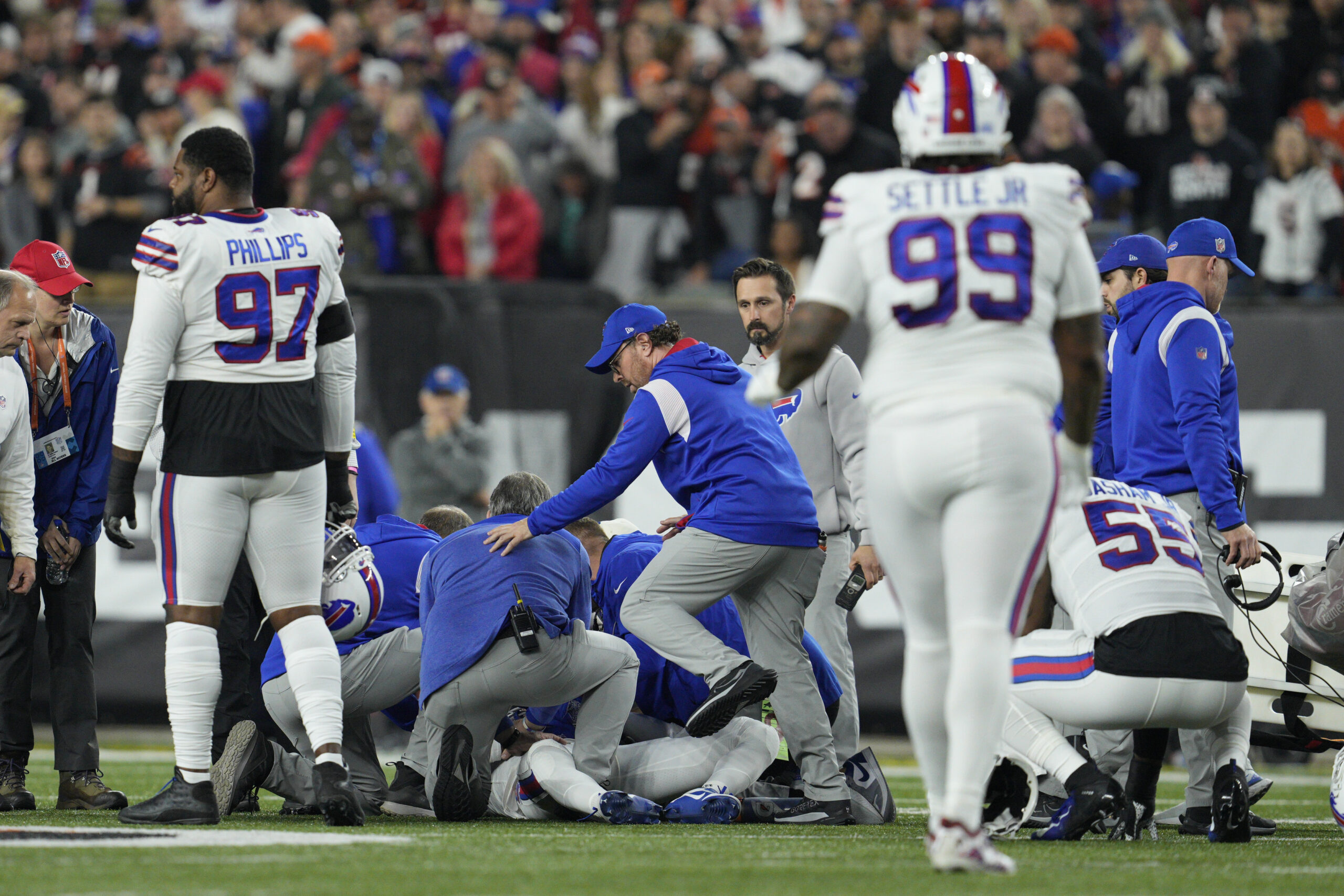 Buffalo Bills' Damar Hamlin is examined during the first half of an NFL football game against the Cincinnati Bengals, Monday, Jan. 2, 2023, in Cincinnati. (AP Photo/Jeff Dean)