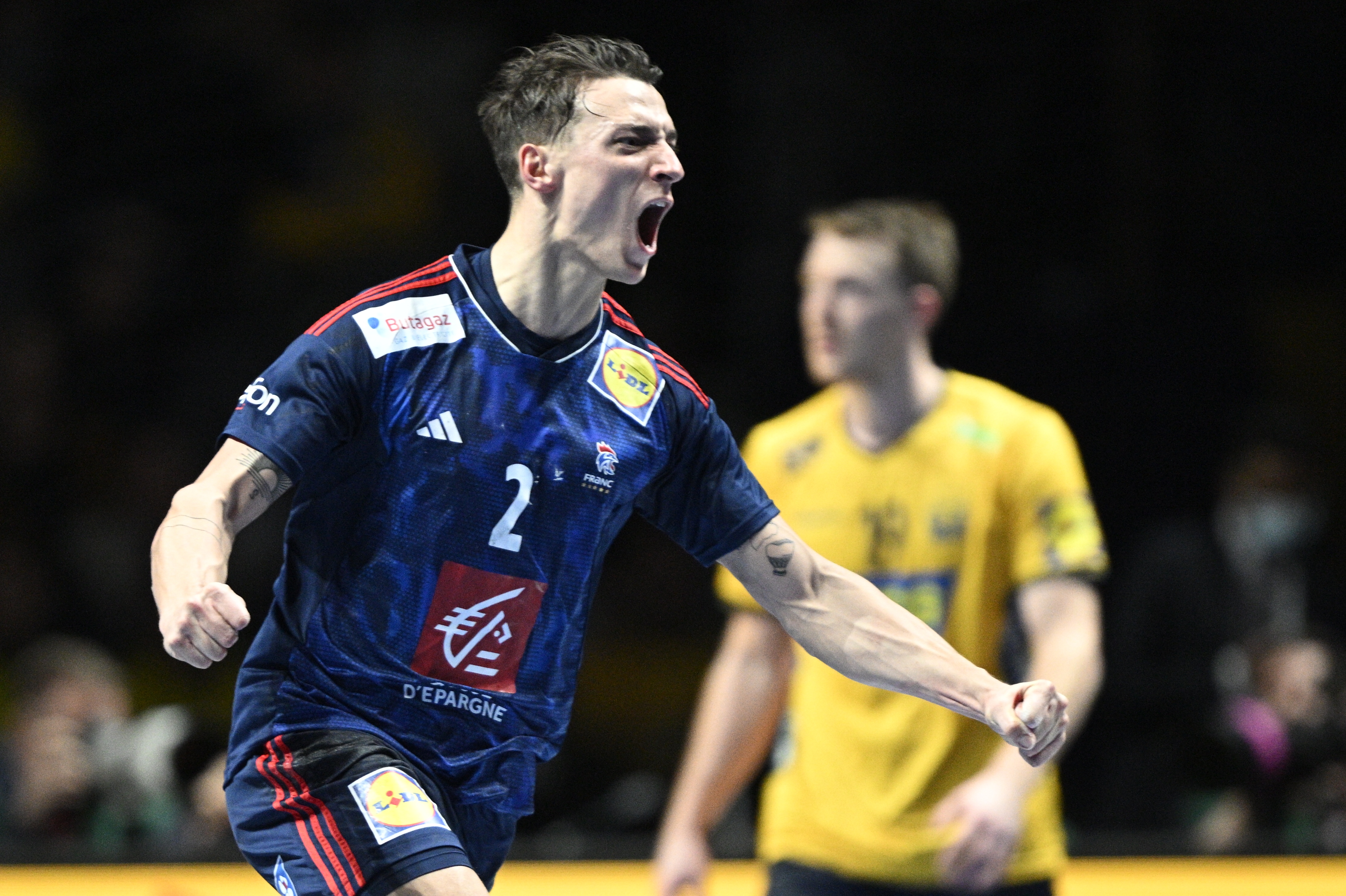 epa10434853 France's Yanis Lenne celebrates during the IHF Men's World Championship handball semi final match between France and Denmark, in Stockholm, Sweden, 27 January 2023.  EPA-EFE/Anders Wiklund  SWEDEN OUT