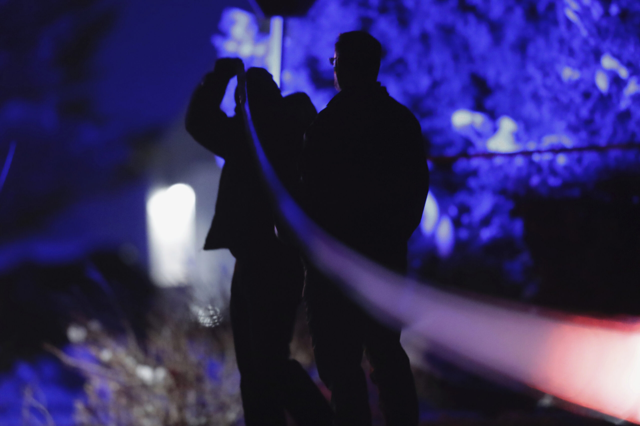 Law enforcement officials stand near the Enoch, Utah, home where eight family members were found dead from gunshot wounds, Wednesday, Jan. 4, 2023. (Ben B. Braun/The Deseret News via AP)