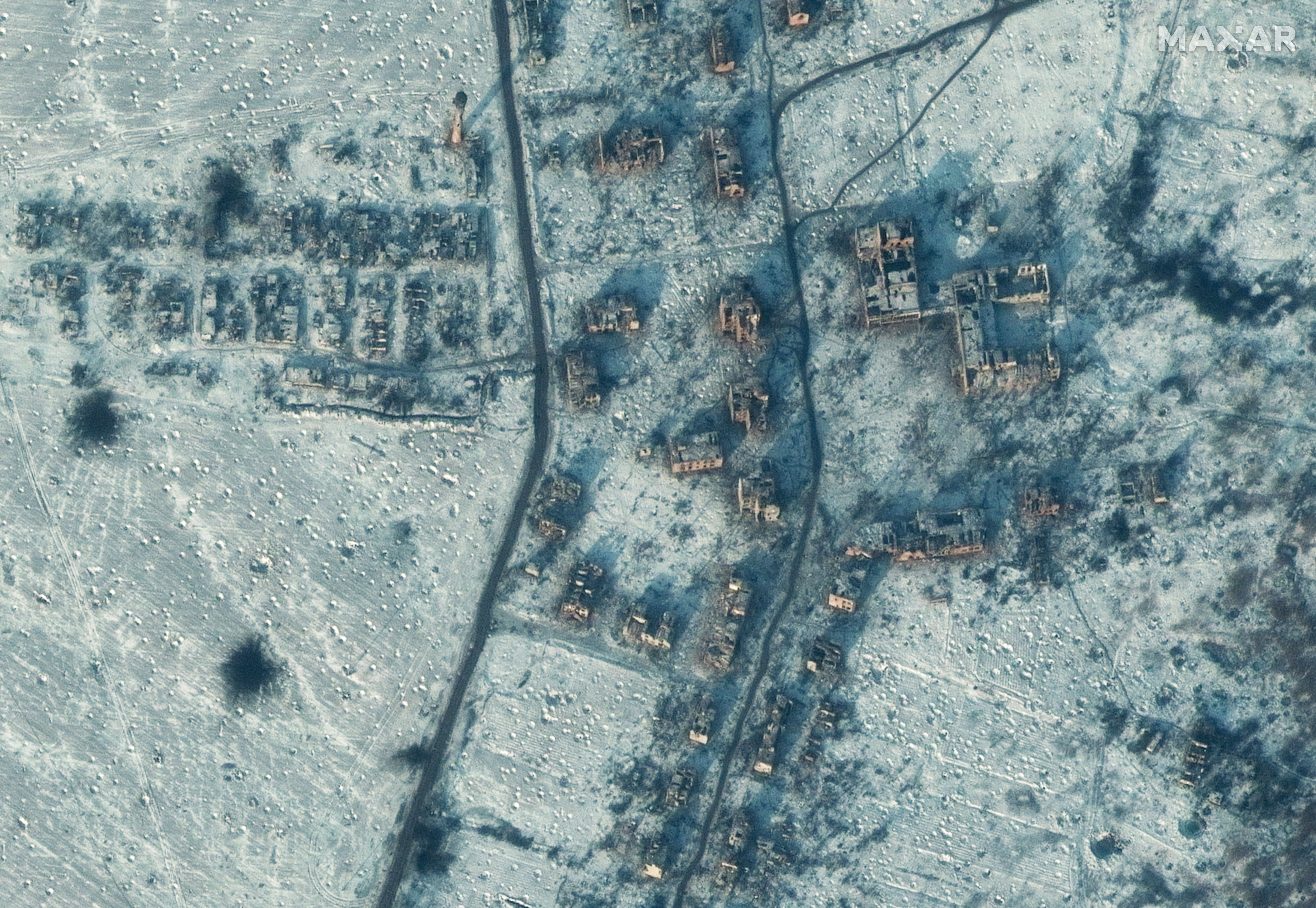 This undated satellite image provided by Maxar Technologies on Tuesday, Jan. 10, 2023, shows the damage to buildings in Soledar, Ukraine. (Maxar Technologies via AP)